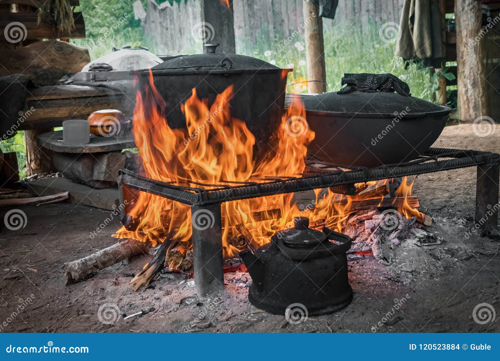 Cook Food On Burning Campfire. Cooking On An Open Fire ...
