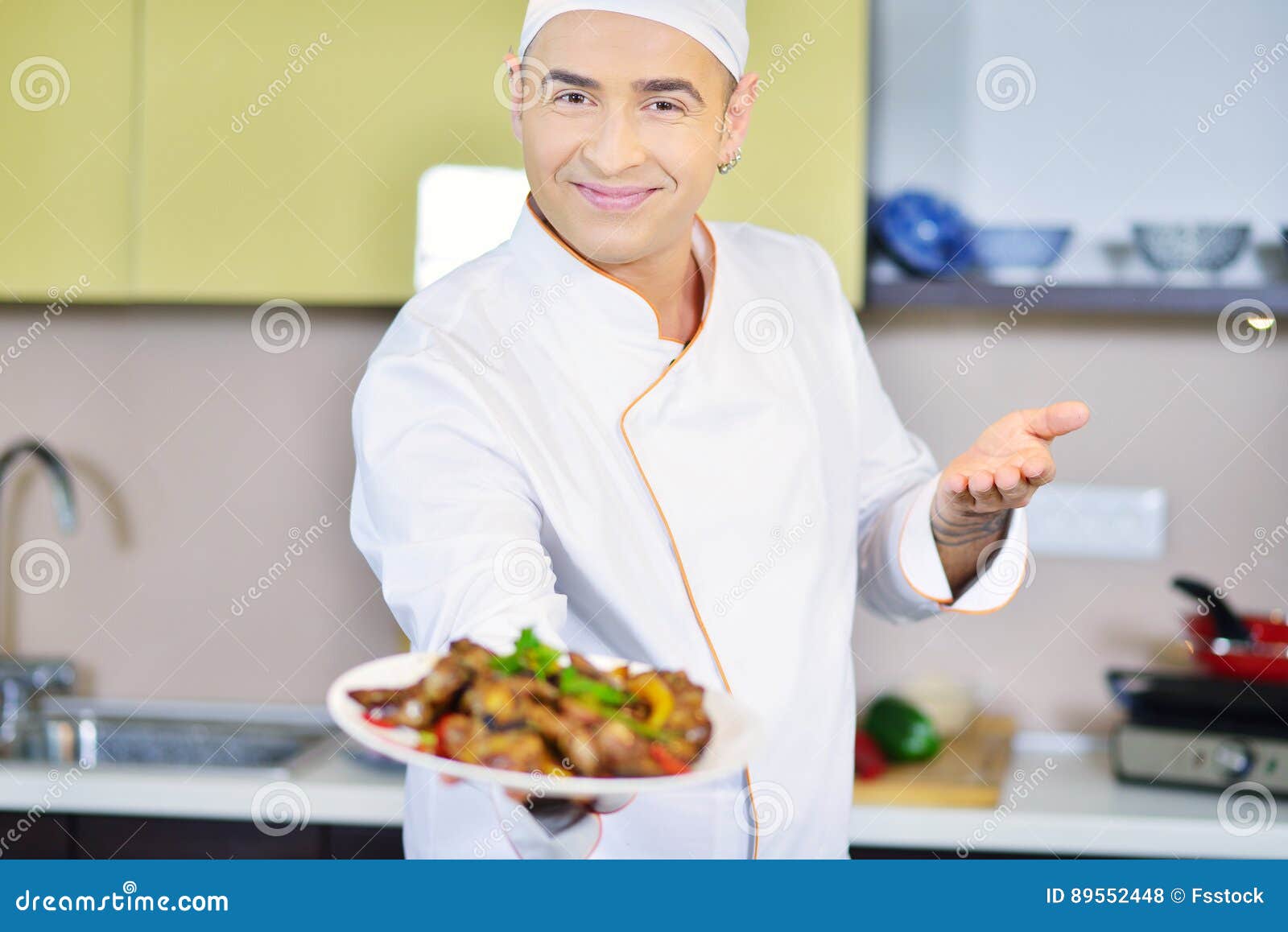 Cook Holding Plate with Food in Gesture Stock Photo Image