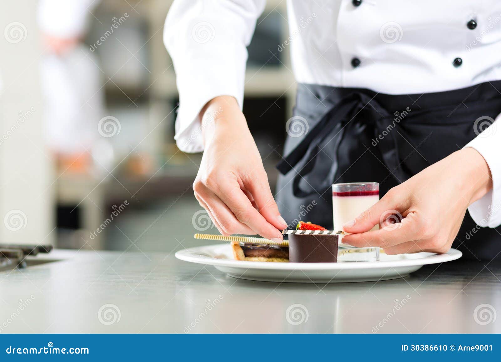 cook, pastry chef, in hotel or restaurant kitchen