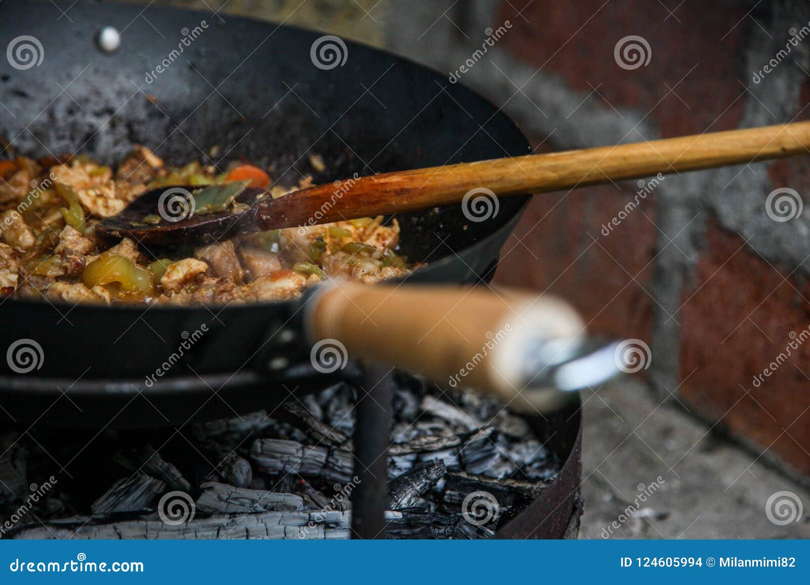 the cook prepares food in natur