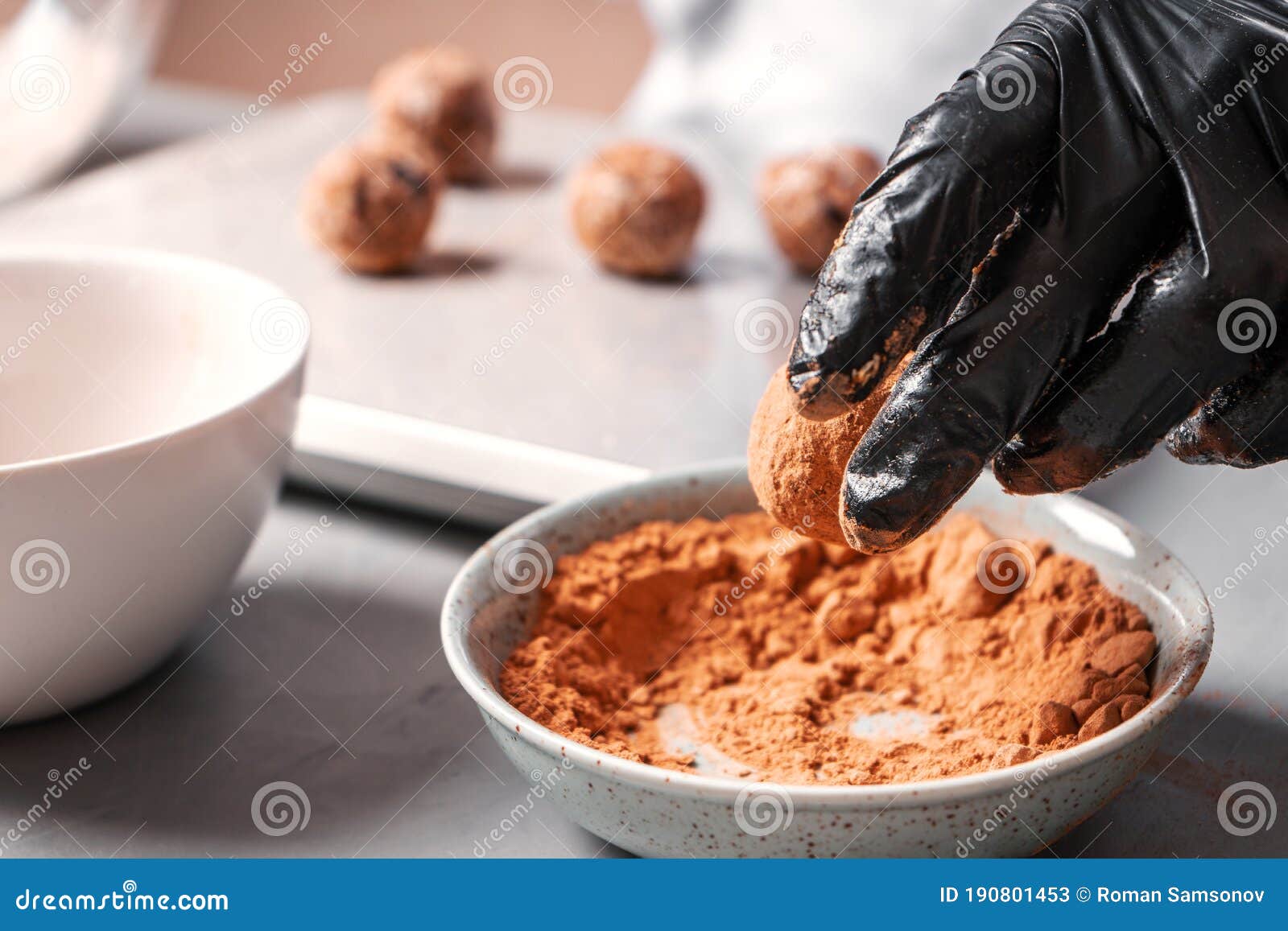 The Cook Rolls Date Balls in Carob or Cocoa Powder Stock Image Image
