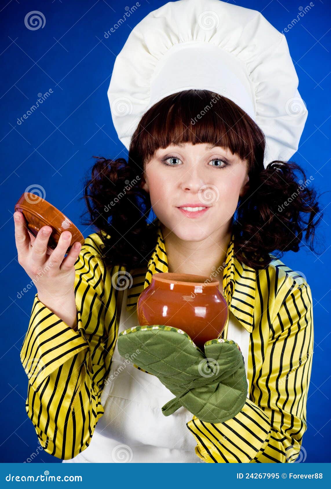 Cook woman holds a hot pot stock image. Image of attractive 24267995