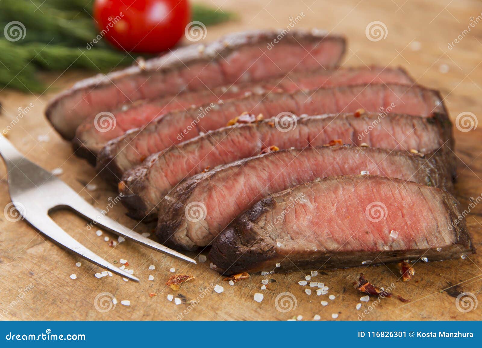 cooked beef steak sliced medium rare close-up