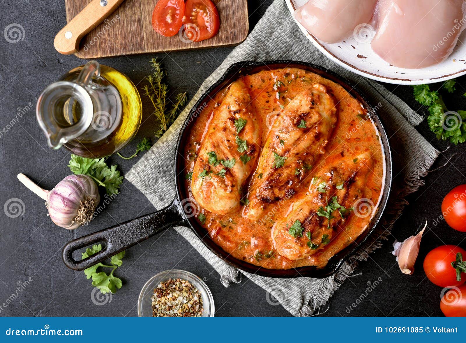 cooked chicken breast with tomato sauce