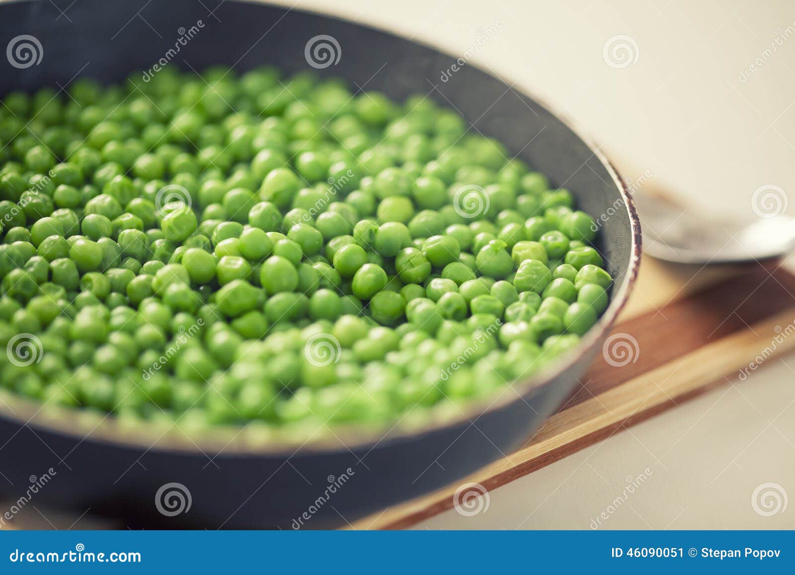 Cooked green peas stock image. Image of family, spoon 46090051