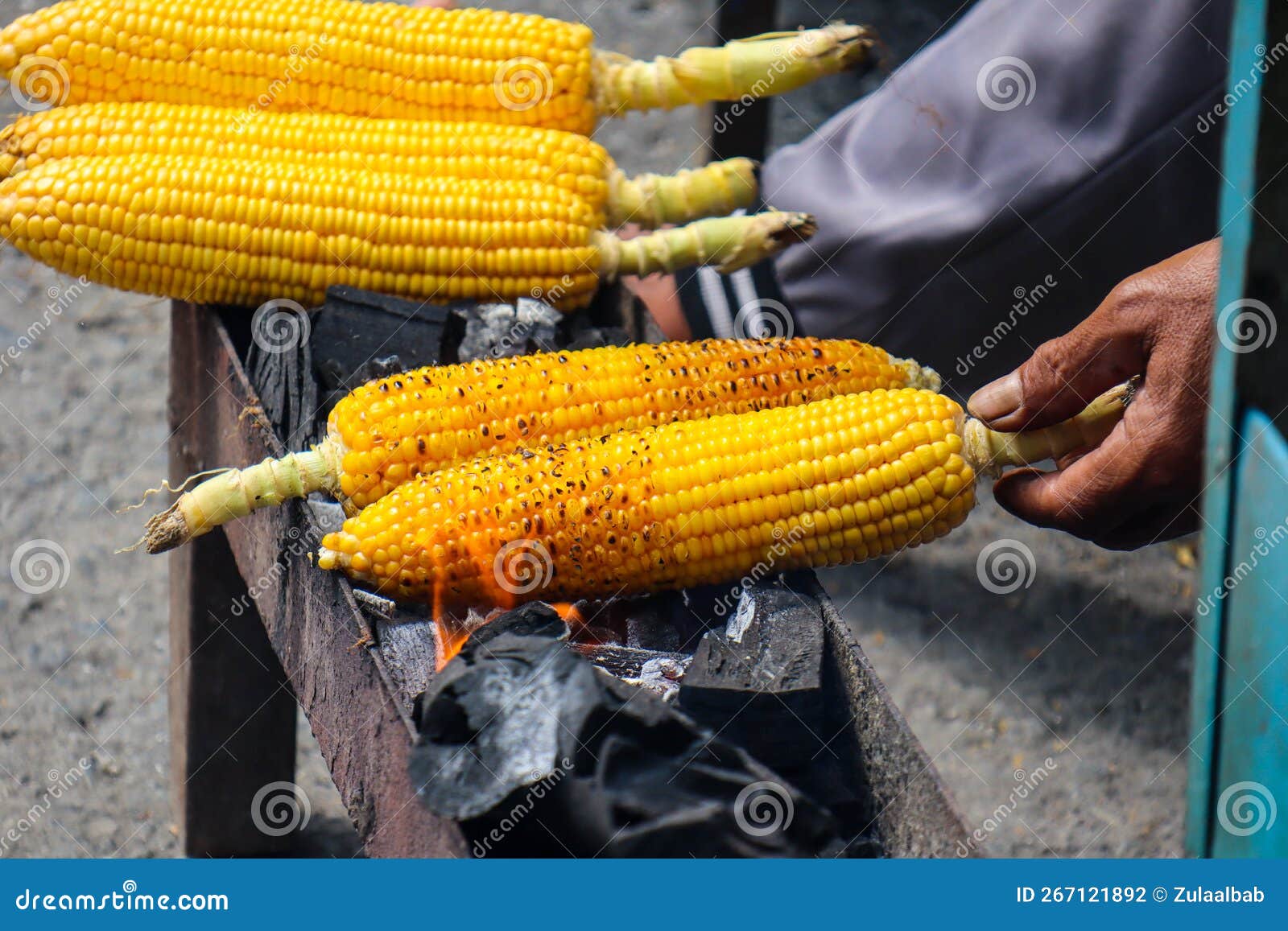 Cooked Grilled Corn Looks Especially Good in Cold Weather Stock Photo