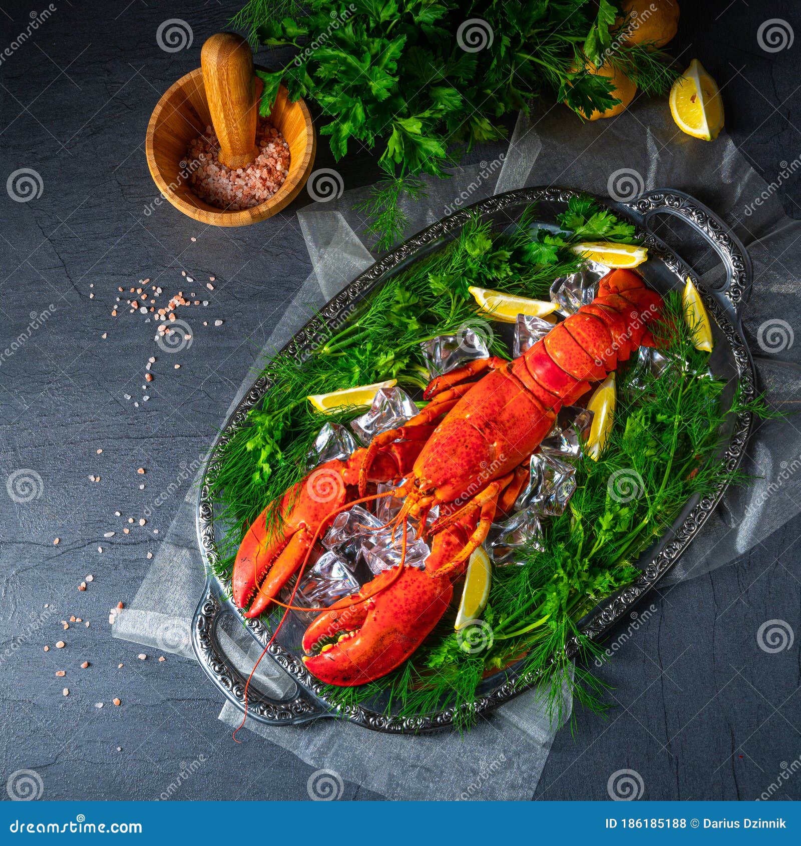 The cooked lobster on ice stock photo. Image of cuisine 186185188