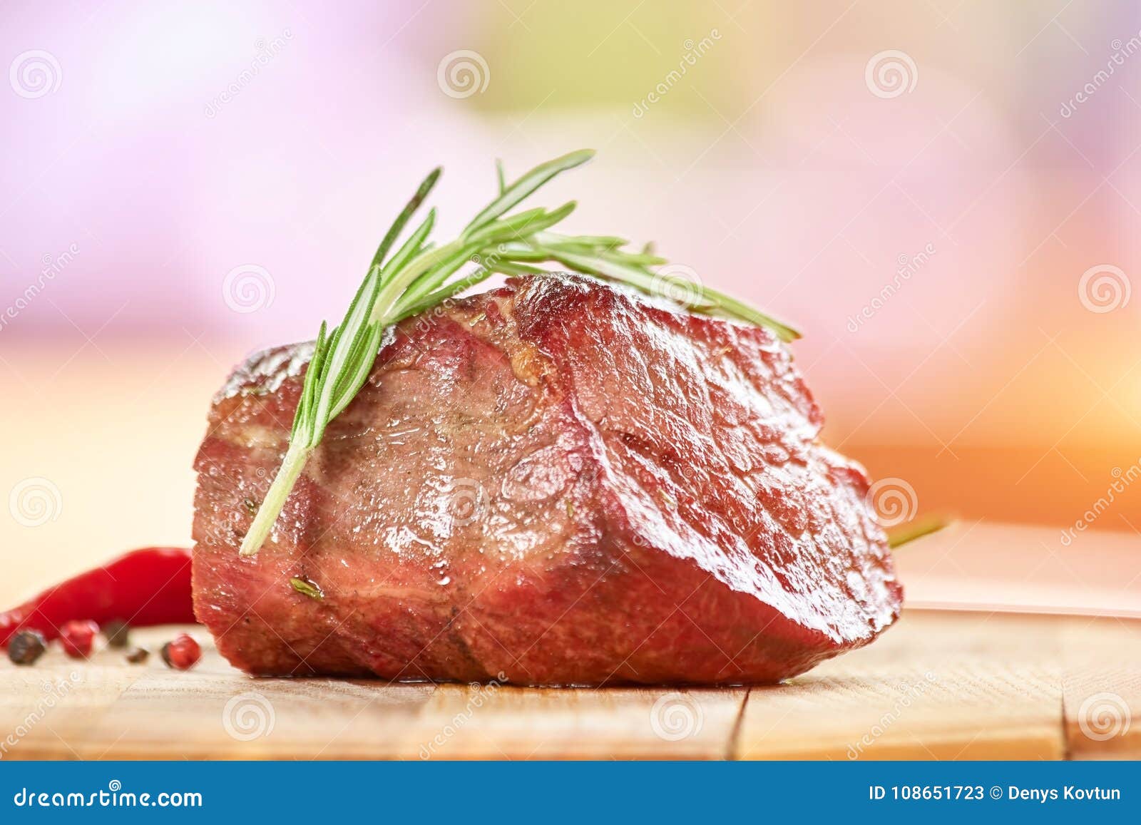 Cooked meat with rosemary. stock image. Image of garnish 108651723