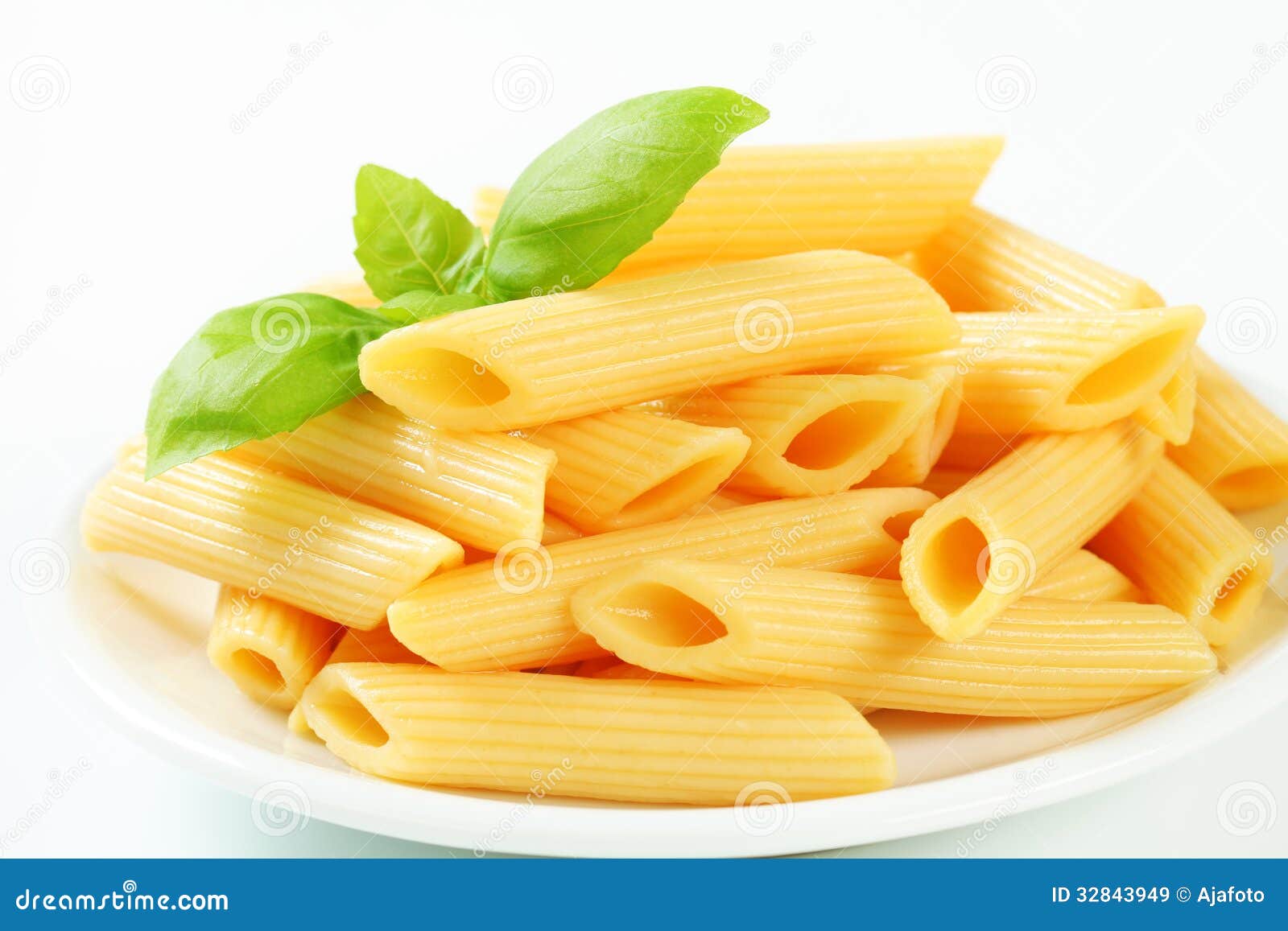 Cooked penne pasta stock image. Image of plate, pile 32843949