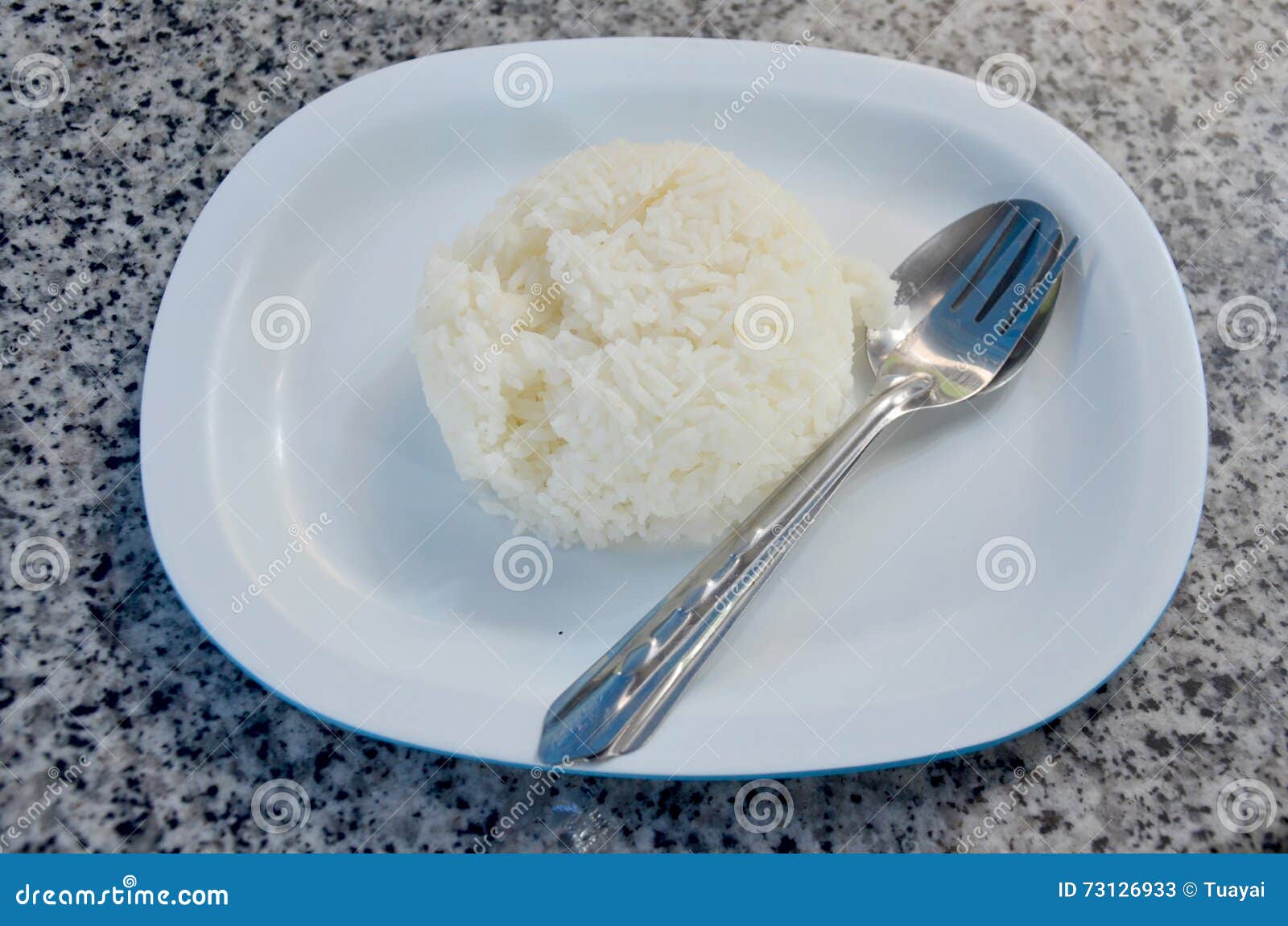 Cooked Rice on Dish with Fork and Spoon Stock Image Image of boiled