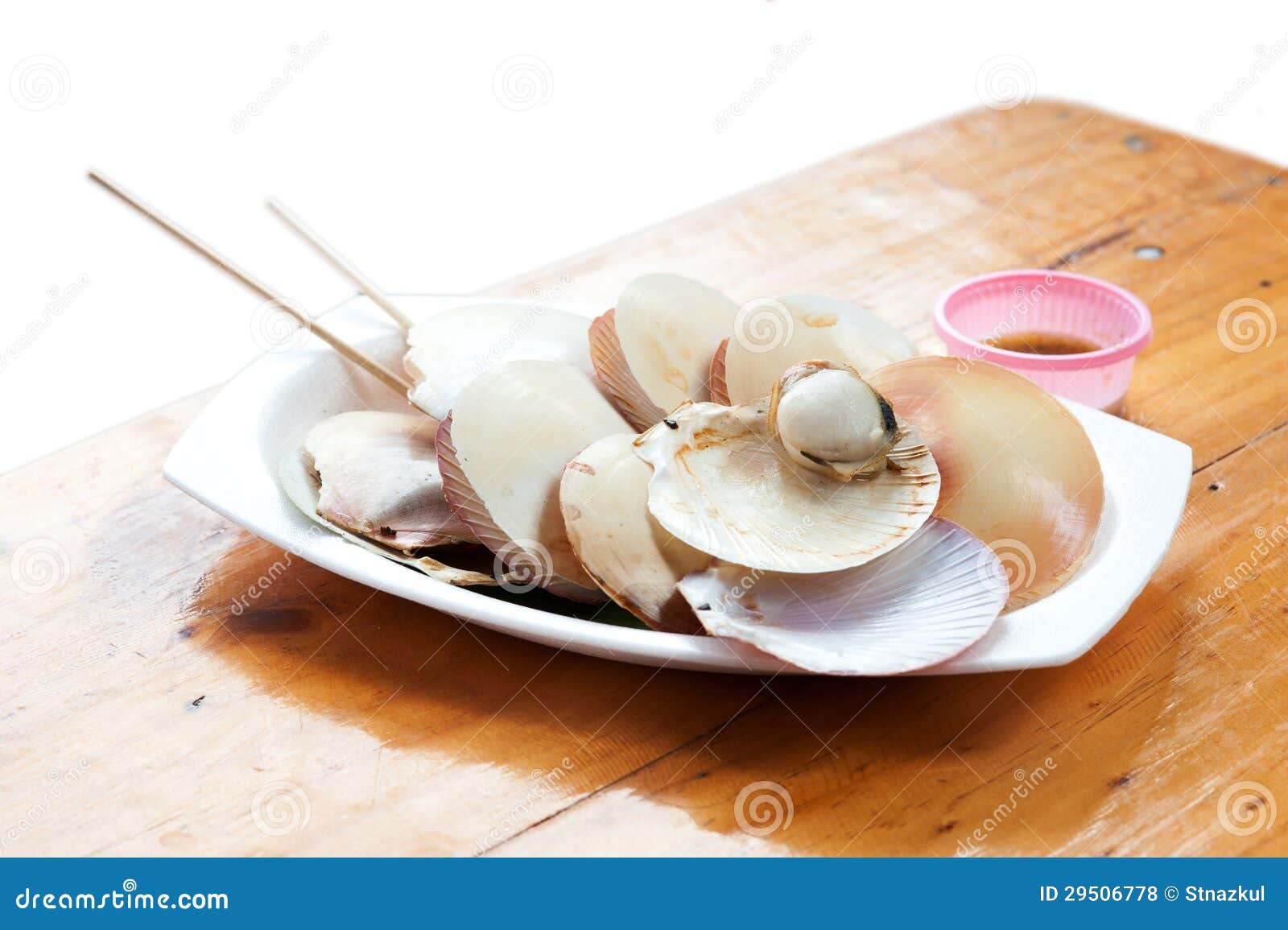 cooked scallops on a plate