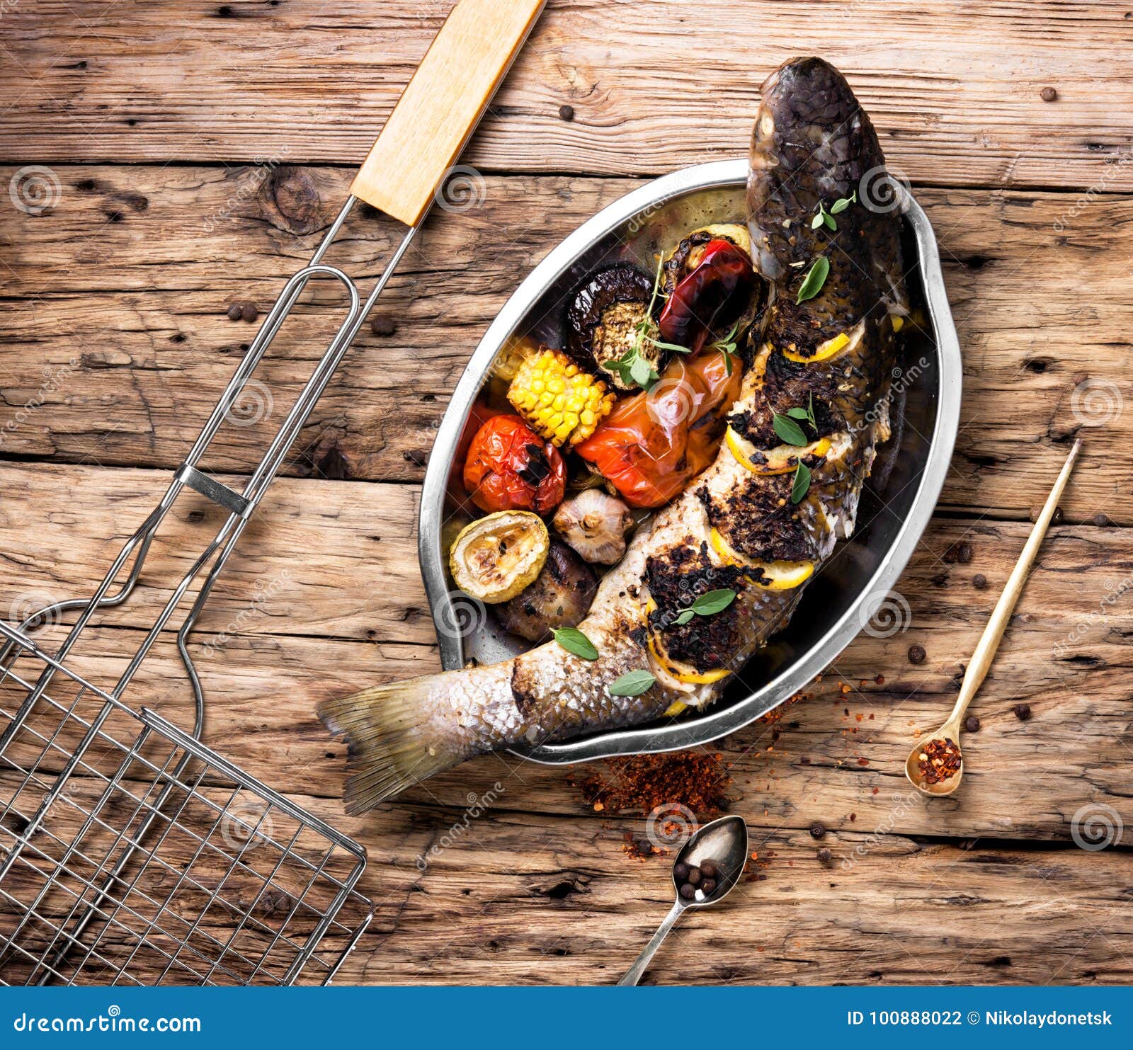 Grilled fish in a tray stock photo. Image of dinner 100888022