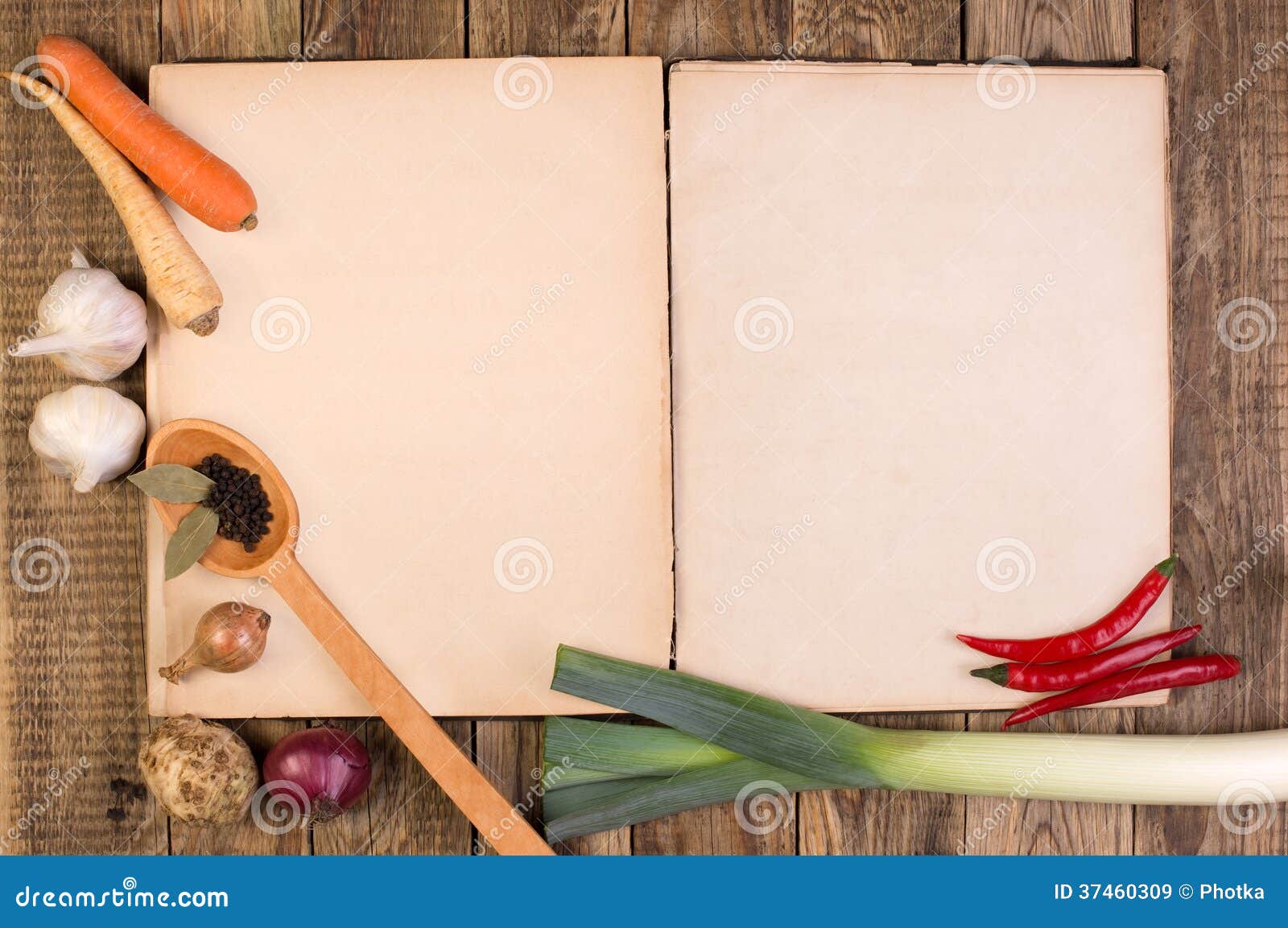 cookery book on wooden background