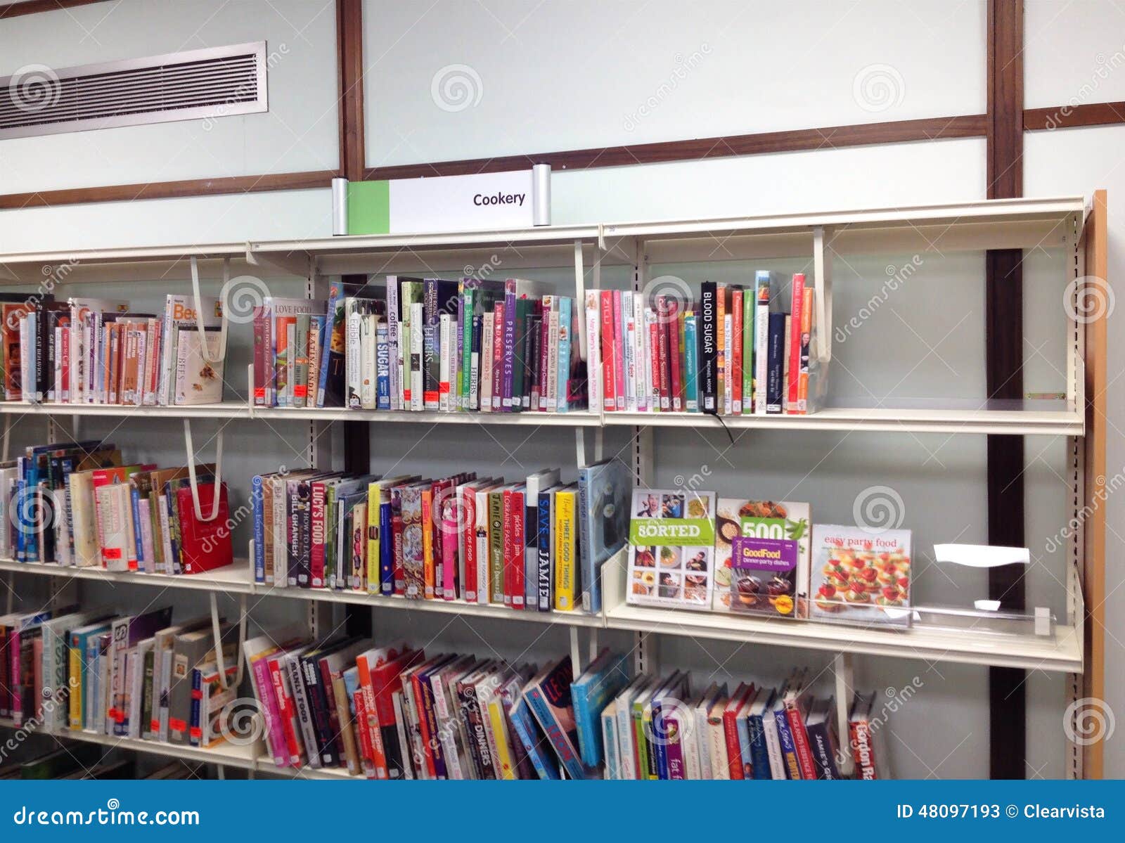 Cookery books on a shelf. editorial stock photo. Image of study 48097193