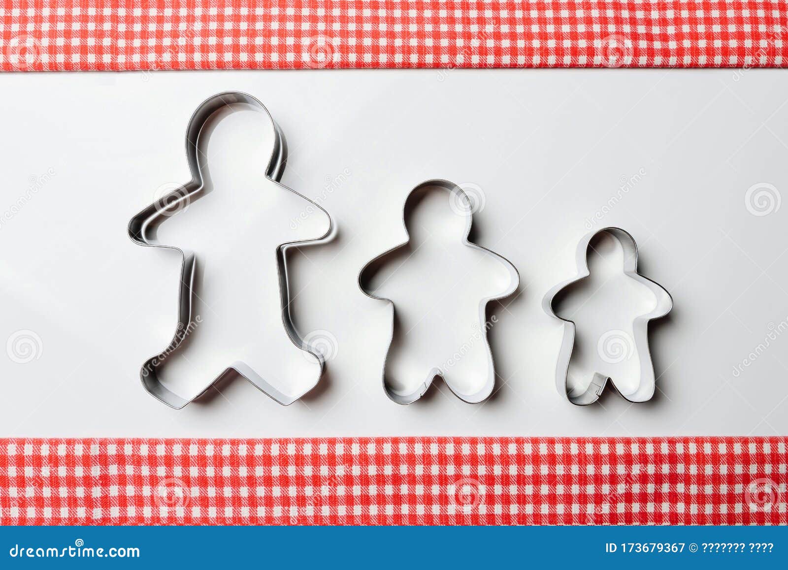 Cookie Cutters in the Form of Men of Different Sizes Stock Image