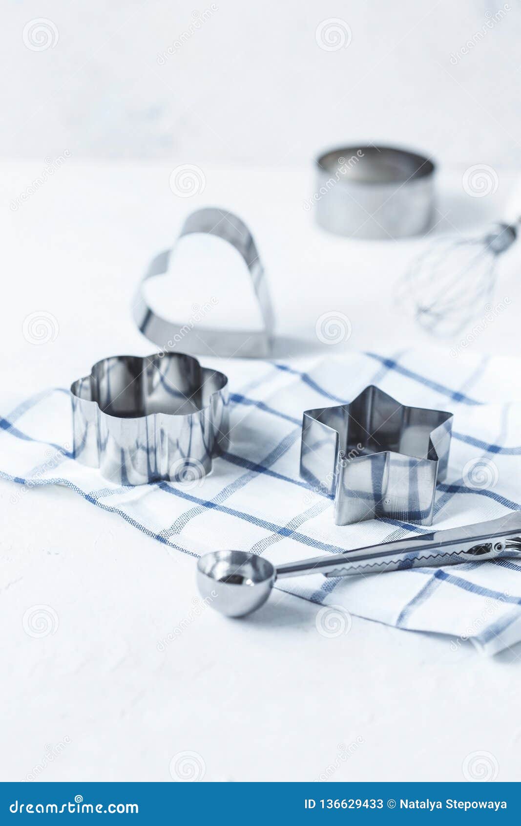 Cookie Cutters, Kitchen Accessories on a White Kitchen Table Stock