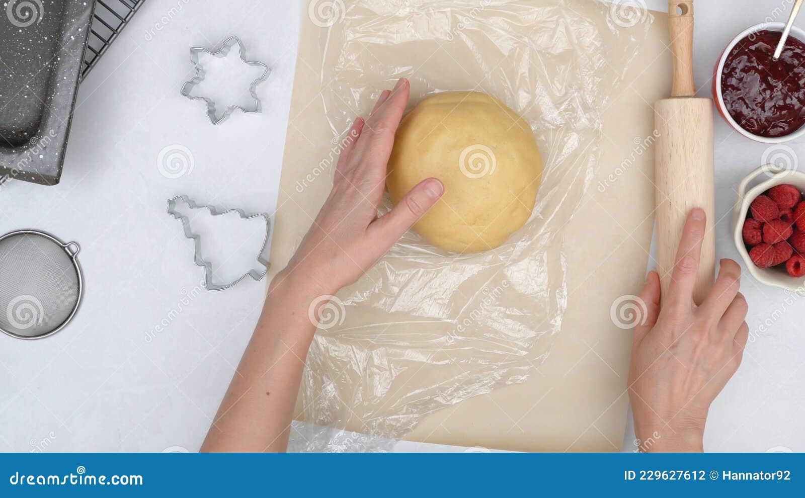 Cookie Dough. Chef Covers Dough with Plastic Wrap Stock Photo Image