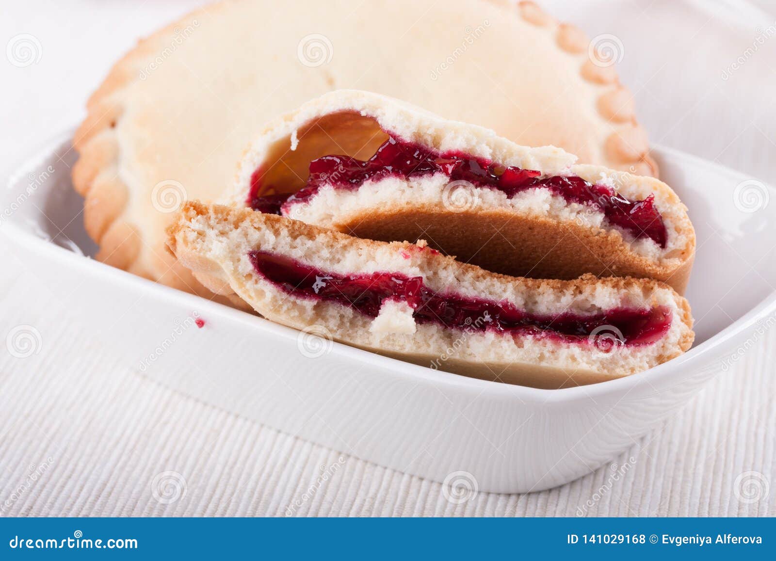 Cookies with cherry jam stock photo. Image of napkin 141029168