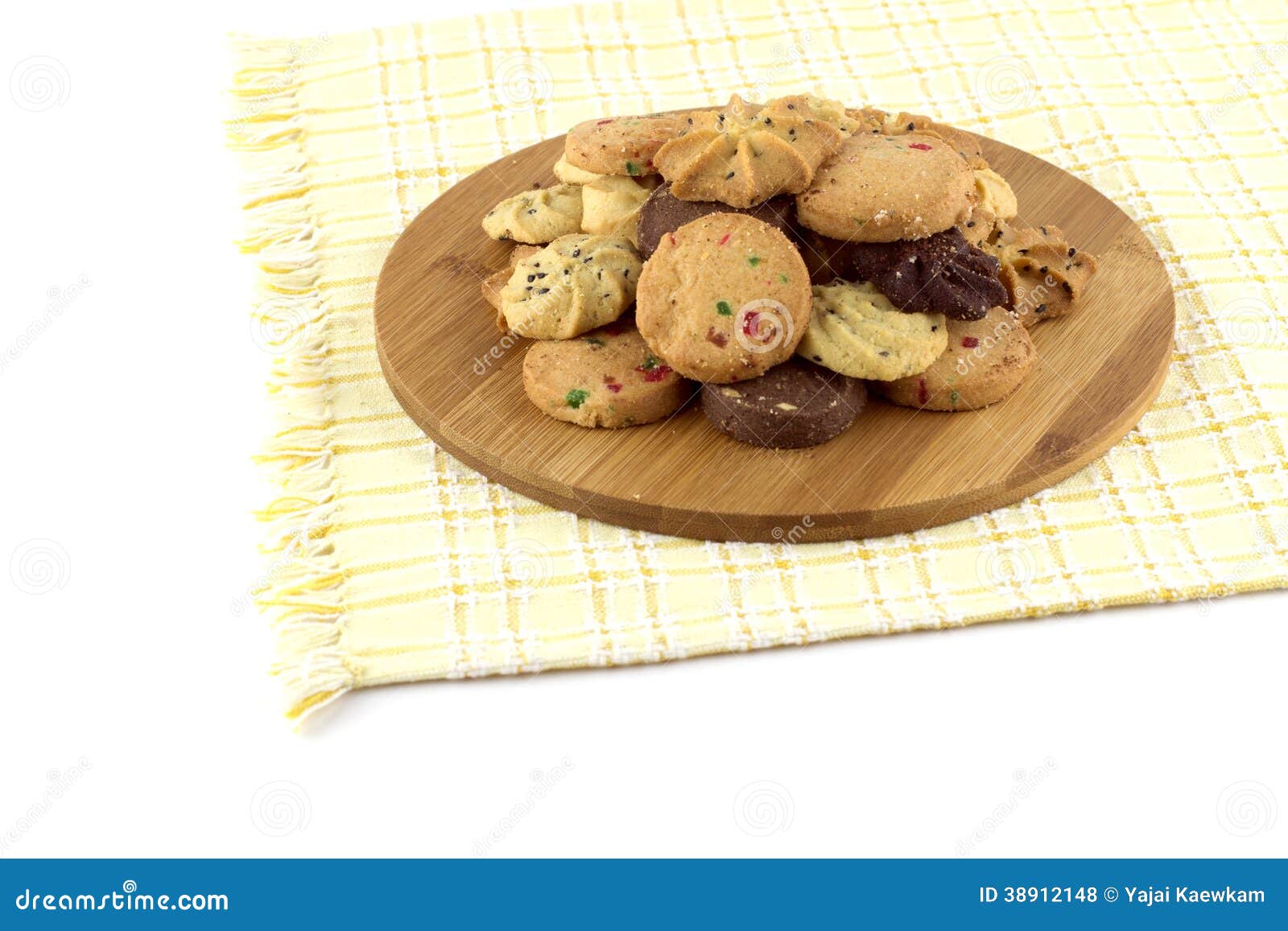 Cookies on wooden plate stock photo.