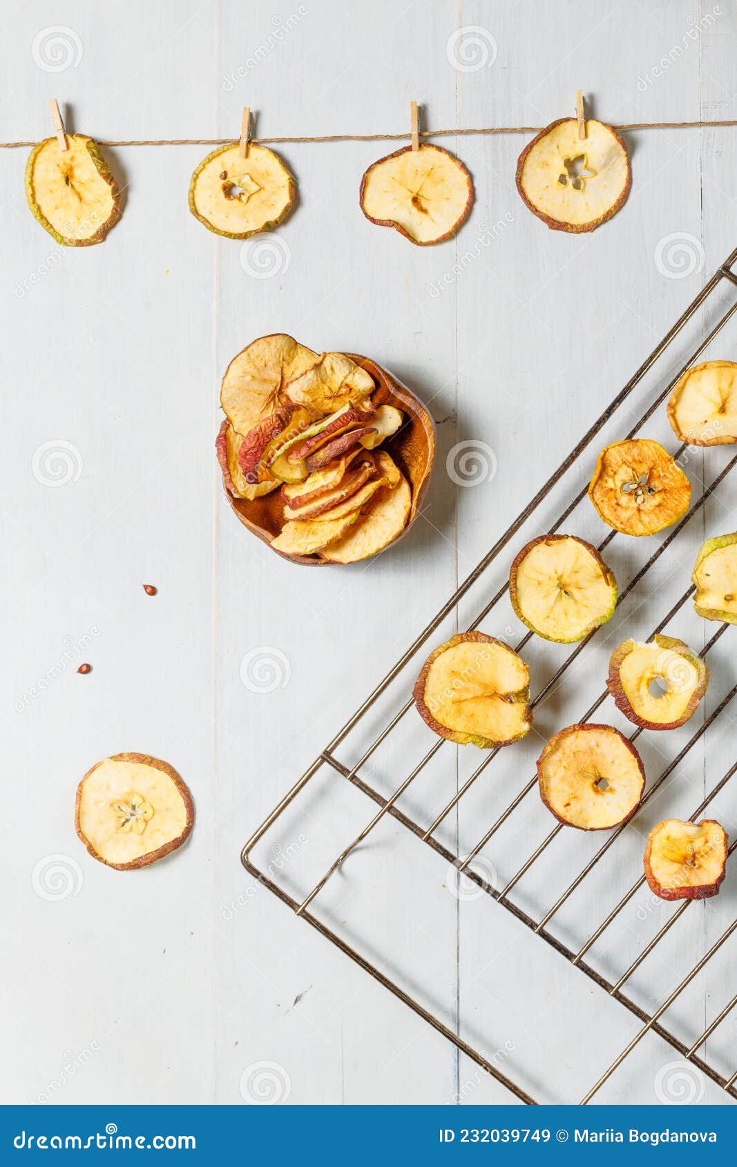 Dried Apples on the Grill, Slices of Apples Hung on a Rope and Ready