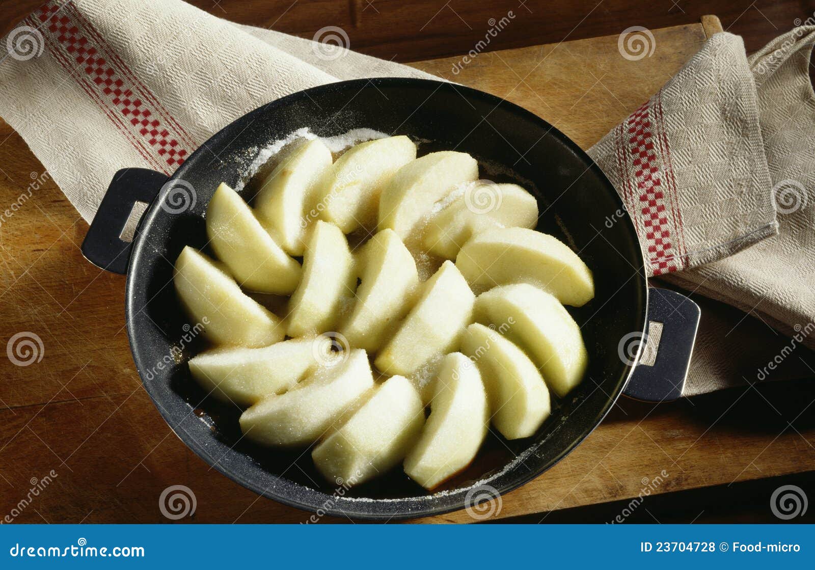 Cooking the apples stock photo. Image of toffee, step 23704728