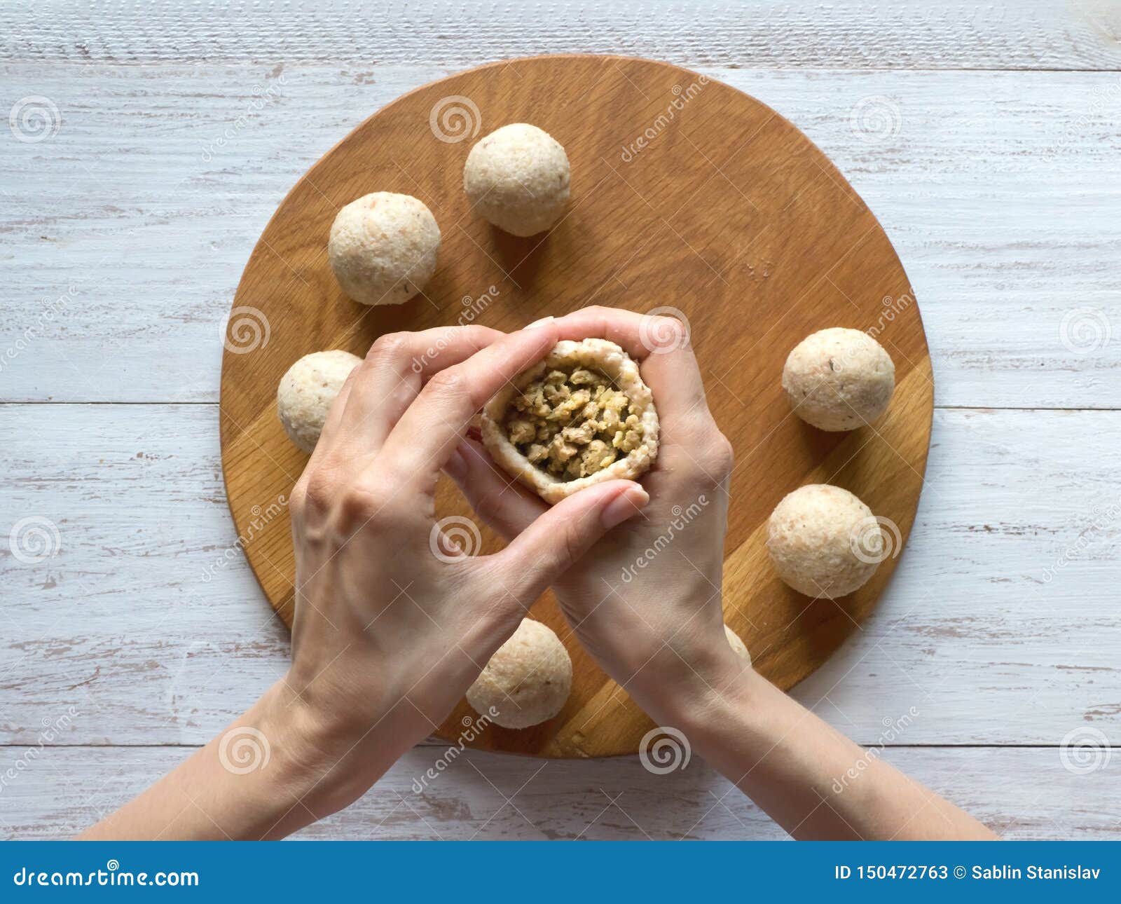 cooking of arabic meat appetizer kibbeh.