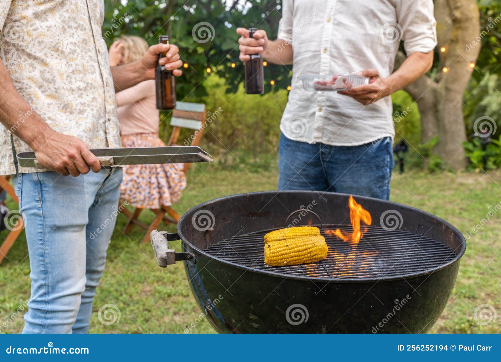 Cooking with the Barbecue Corn and Meat. Fire and Smoke on the Grill