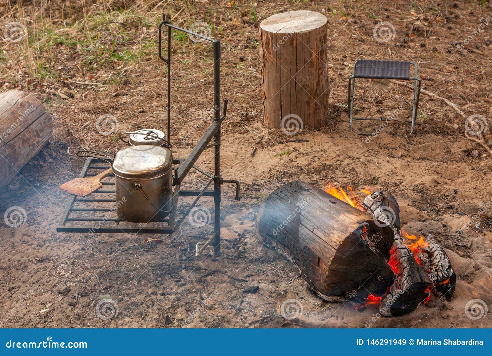 Cooking on Campfire Equipment in a Tent Camp Stock Image Image of