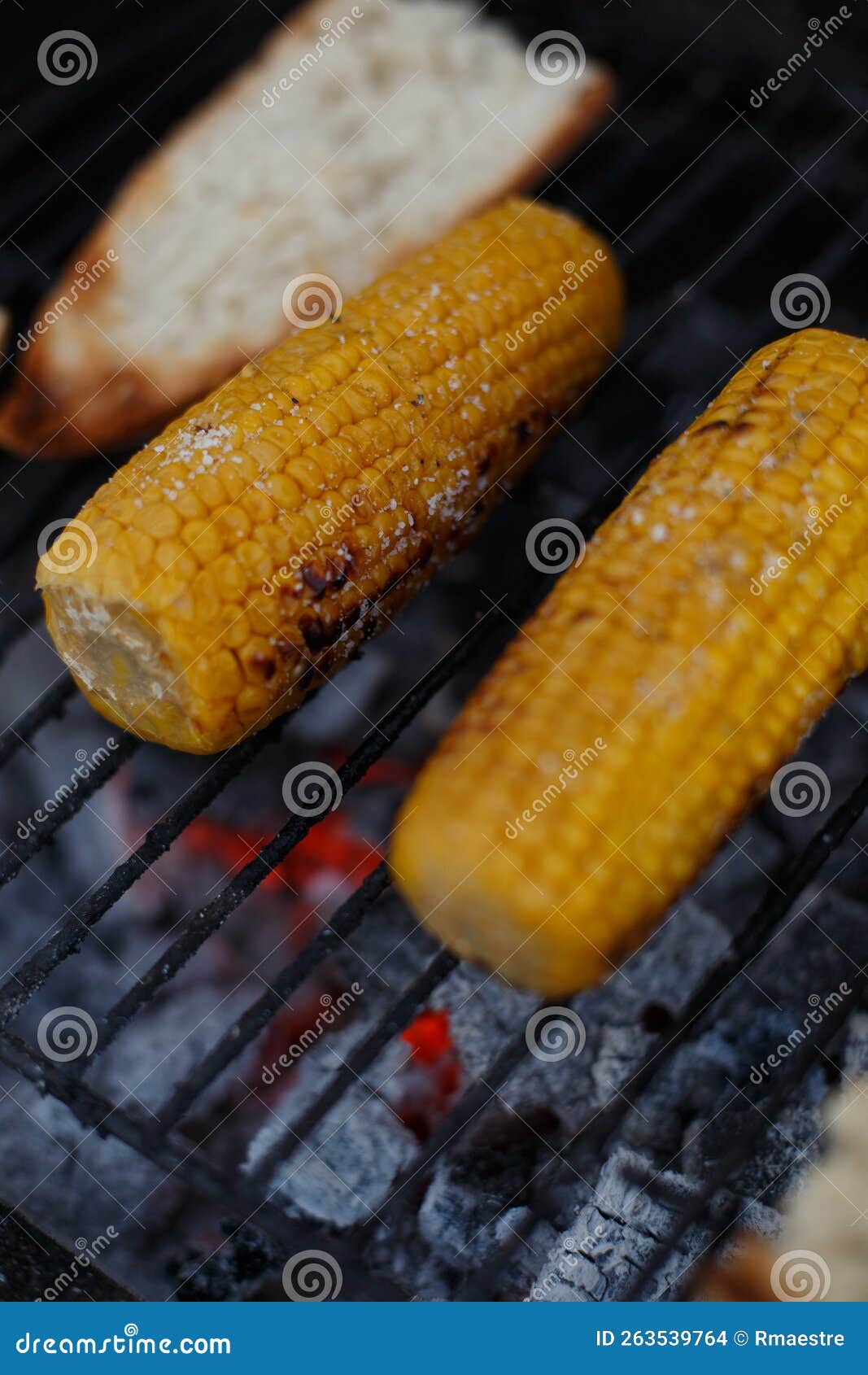 Cooking Corn on the Cob on the Grill, Outside the House Stock Photo