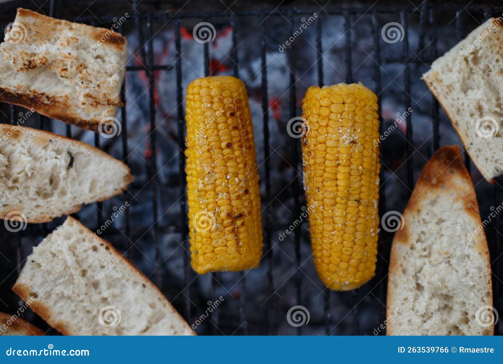 Cooking Corn on the Cob on the Grill, Outside the House Stock Photo