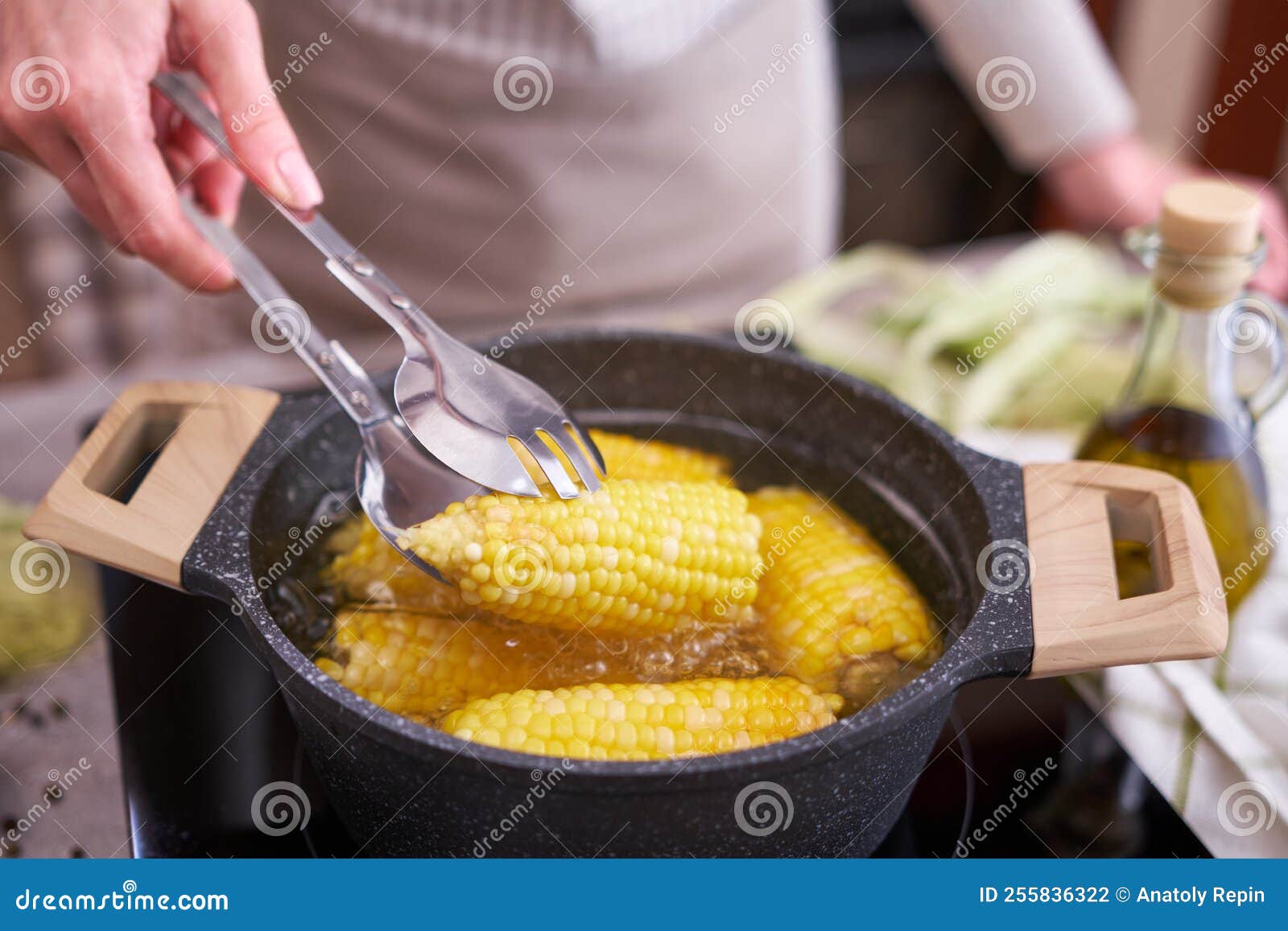 Cooking Corn Cob in a Pot of Boiling Water with Bubbles Stock Photo Image of tasty, woman