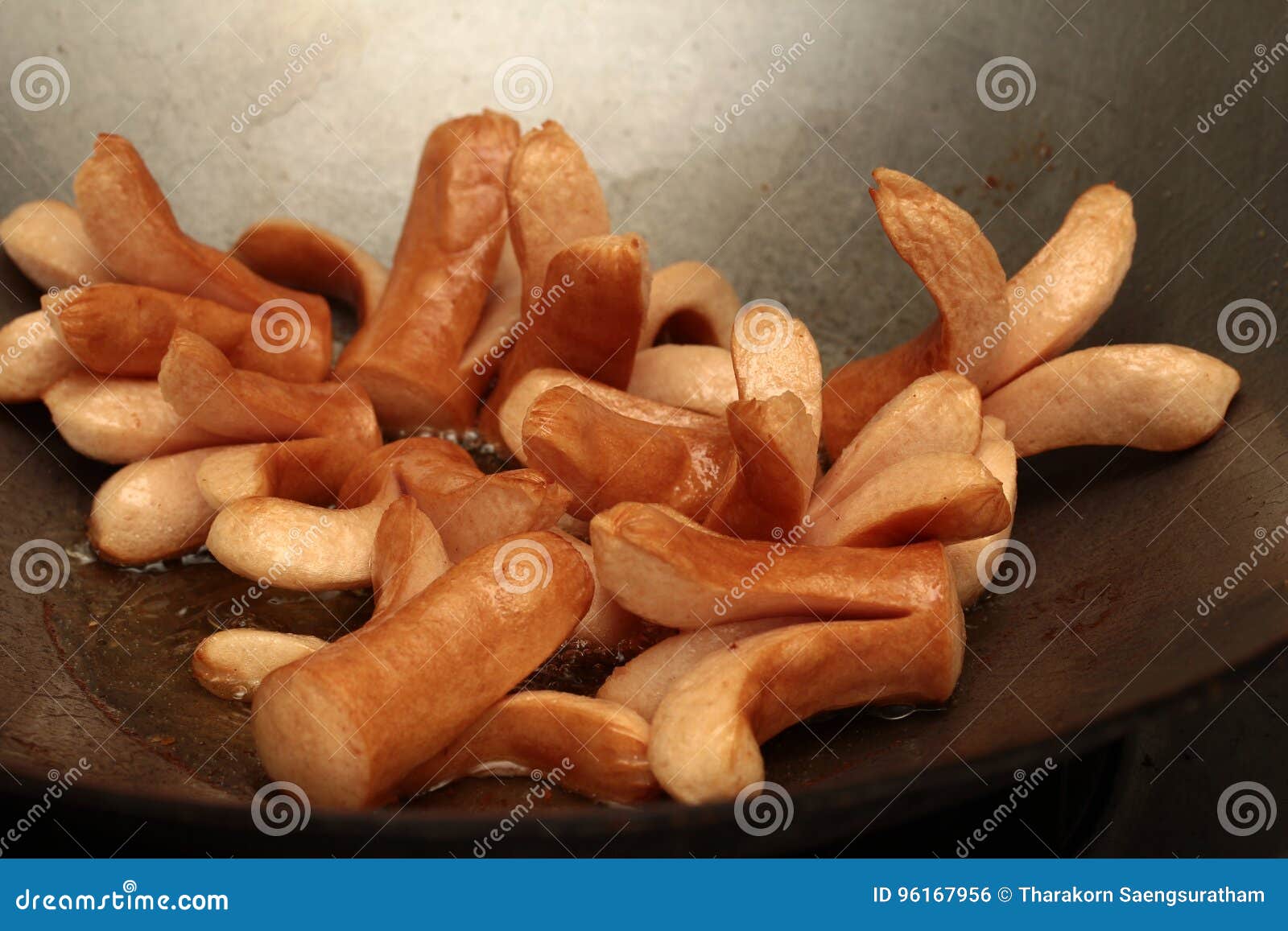 Cooking of Deep Fried Chicken Sausage in Pan. Stock Photo Image of