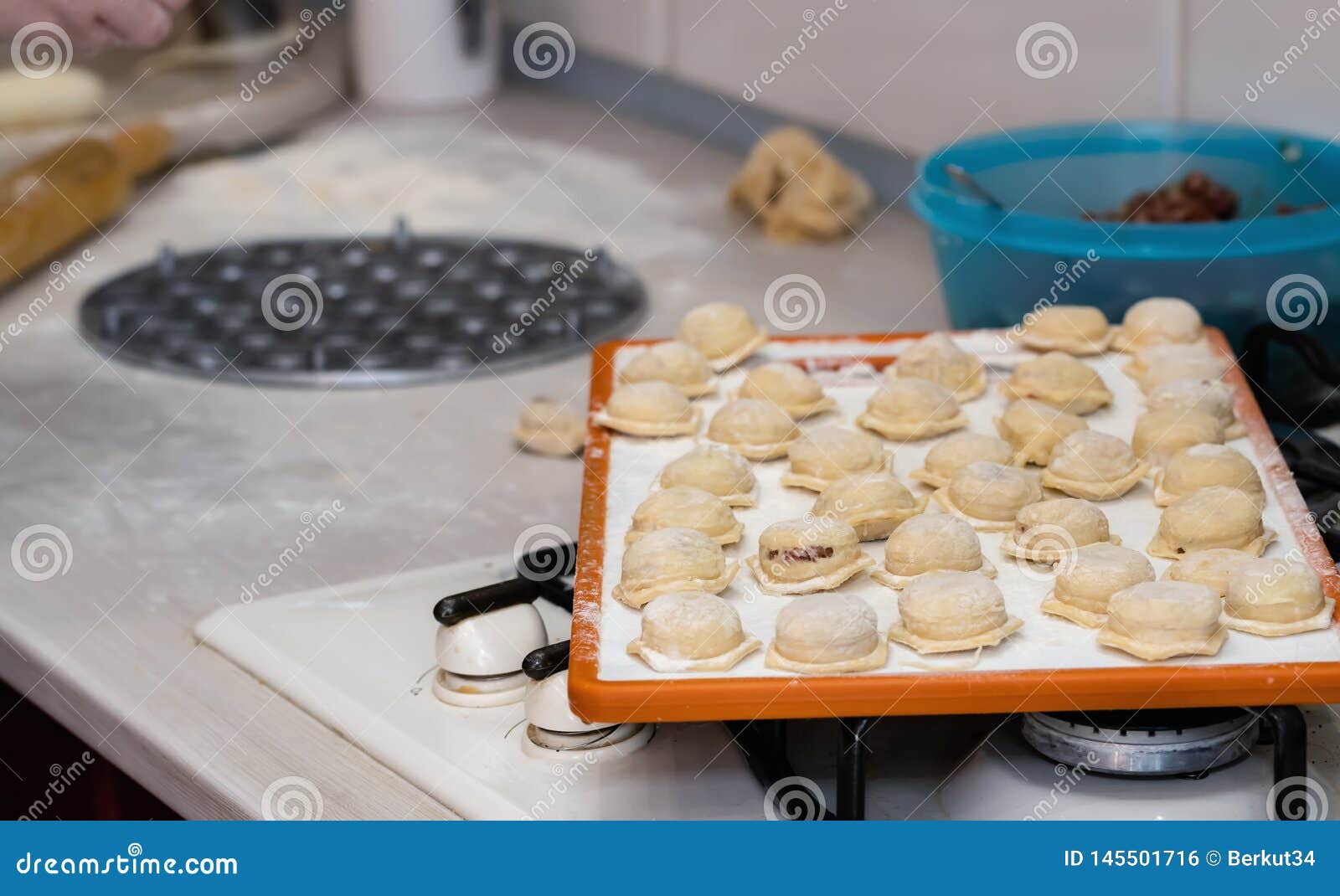 Cooking dumplings at home stock photo. Image of pelmeni - 145501716