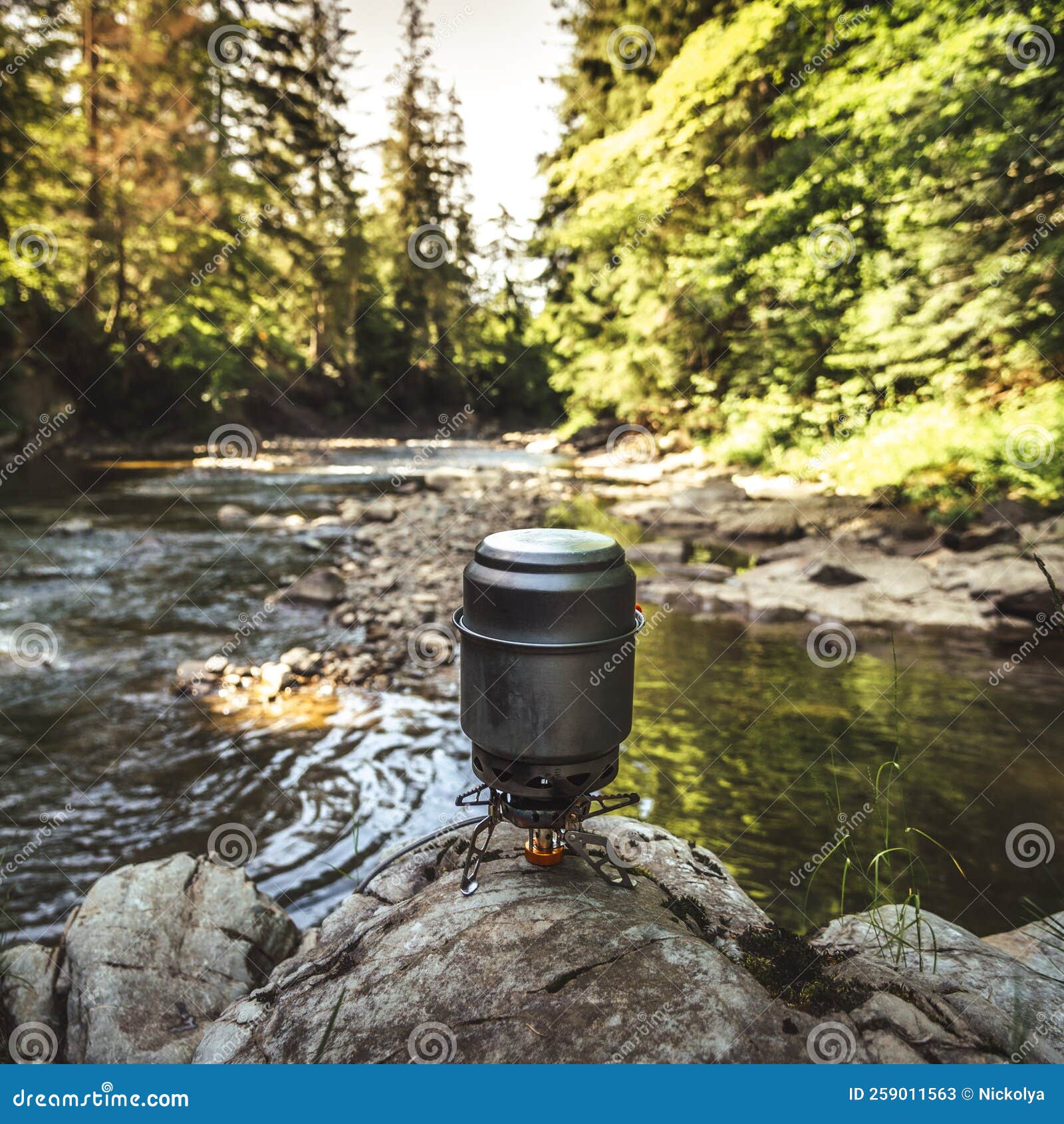 Cooking Food Using Camping Gas during the Hike. Stock Image Image of