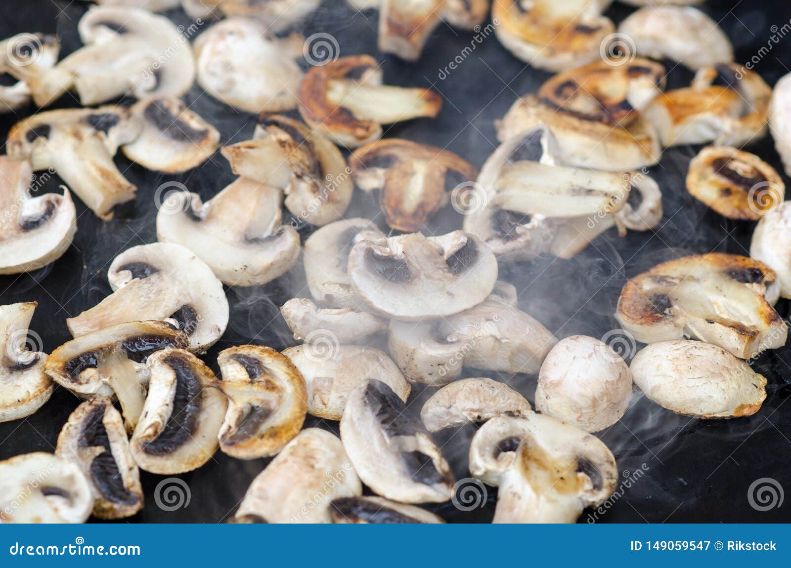 cooking grilled mushrooms champignons, they are a party food