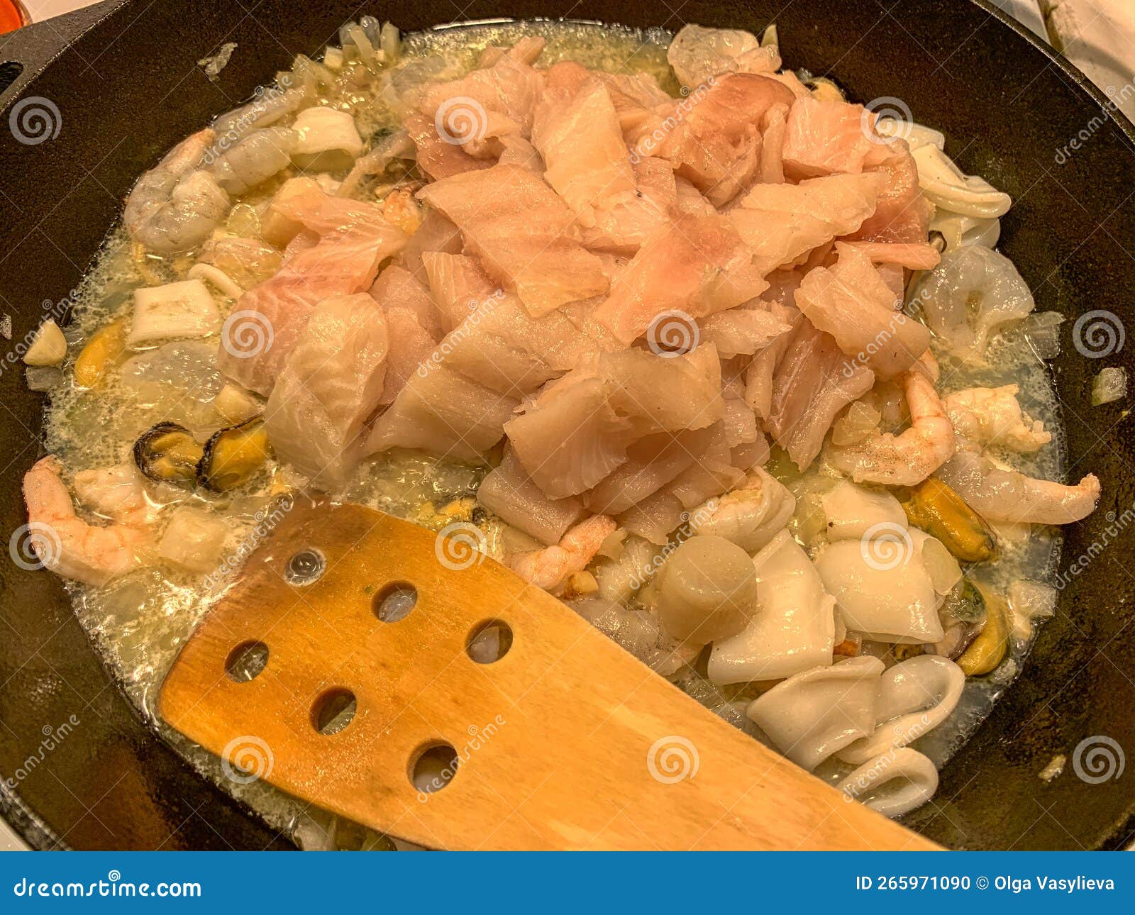 Cooking and Making a Traditional Spanish Paella Stock Photo Image of temperature, indoors
