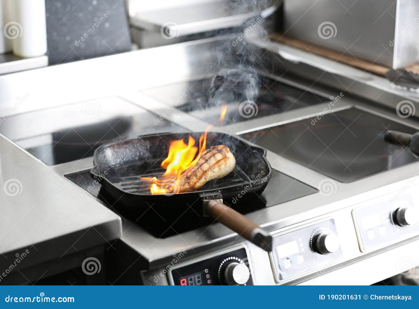 Cooking Meat with Flame in Restaurant Kitchen Stock Image Image of