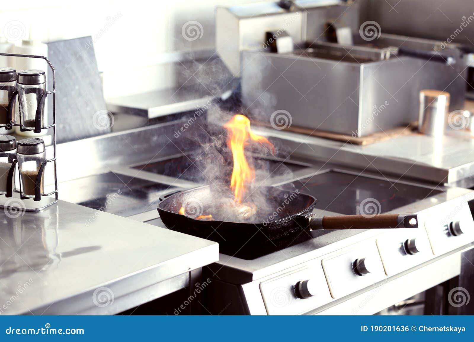 Cooking Meat with Flame in Restaurant Kitchen Stock Photo Image of