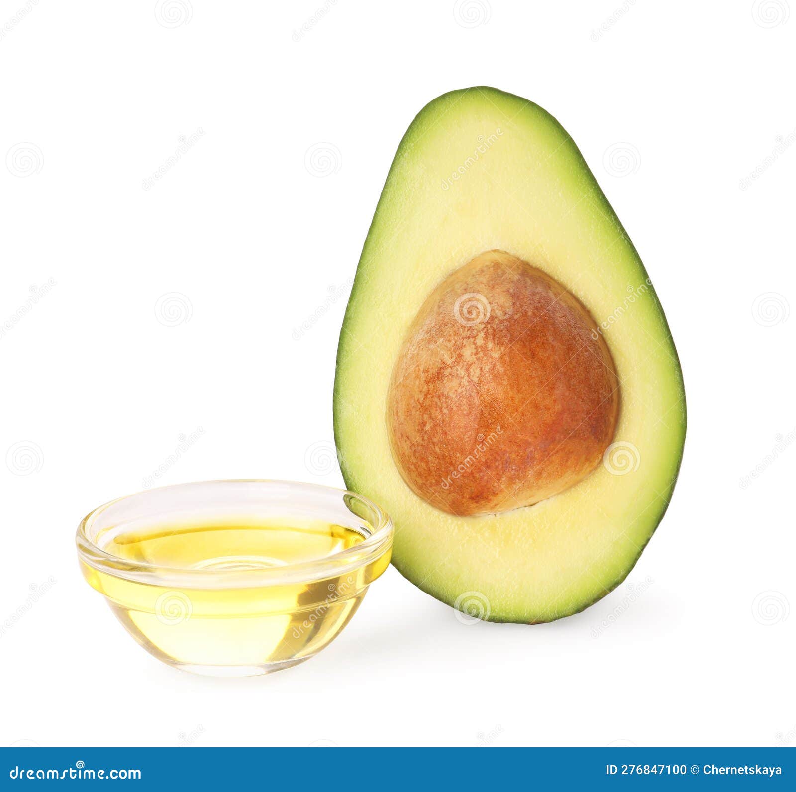 Cooking Oil and Half of Fresh Avocado Isolated Stock Photo Image of