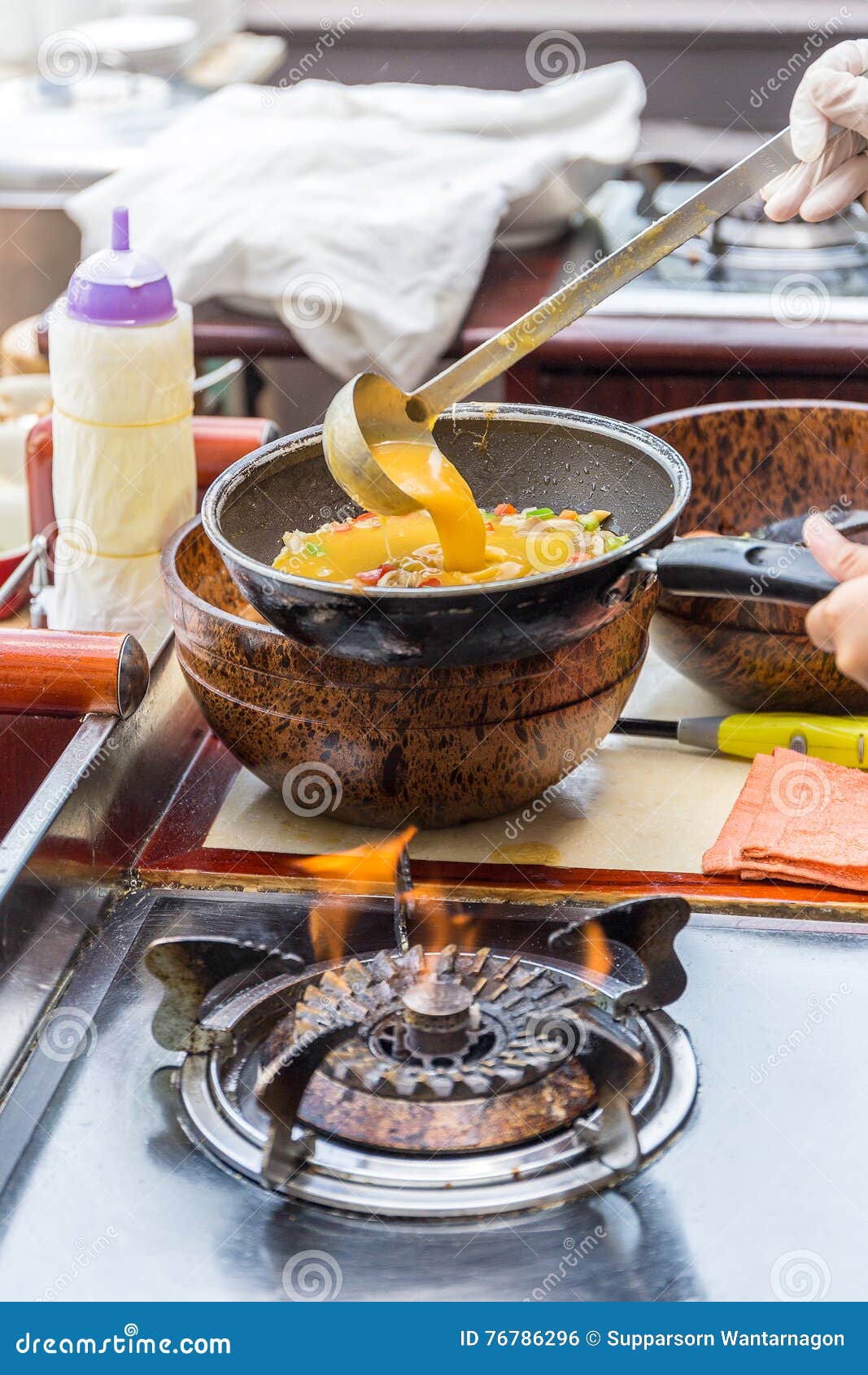 Cooking Omelet in Pan stock photo. Image of chef, cooking 76786296