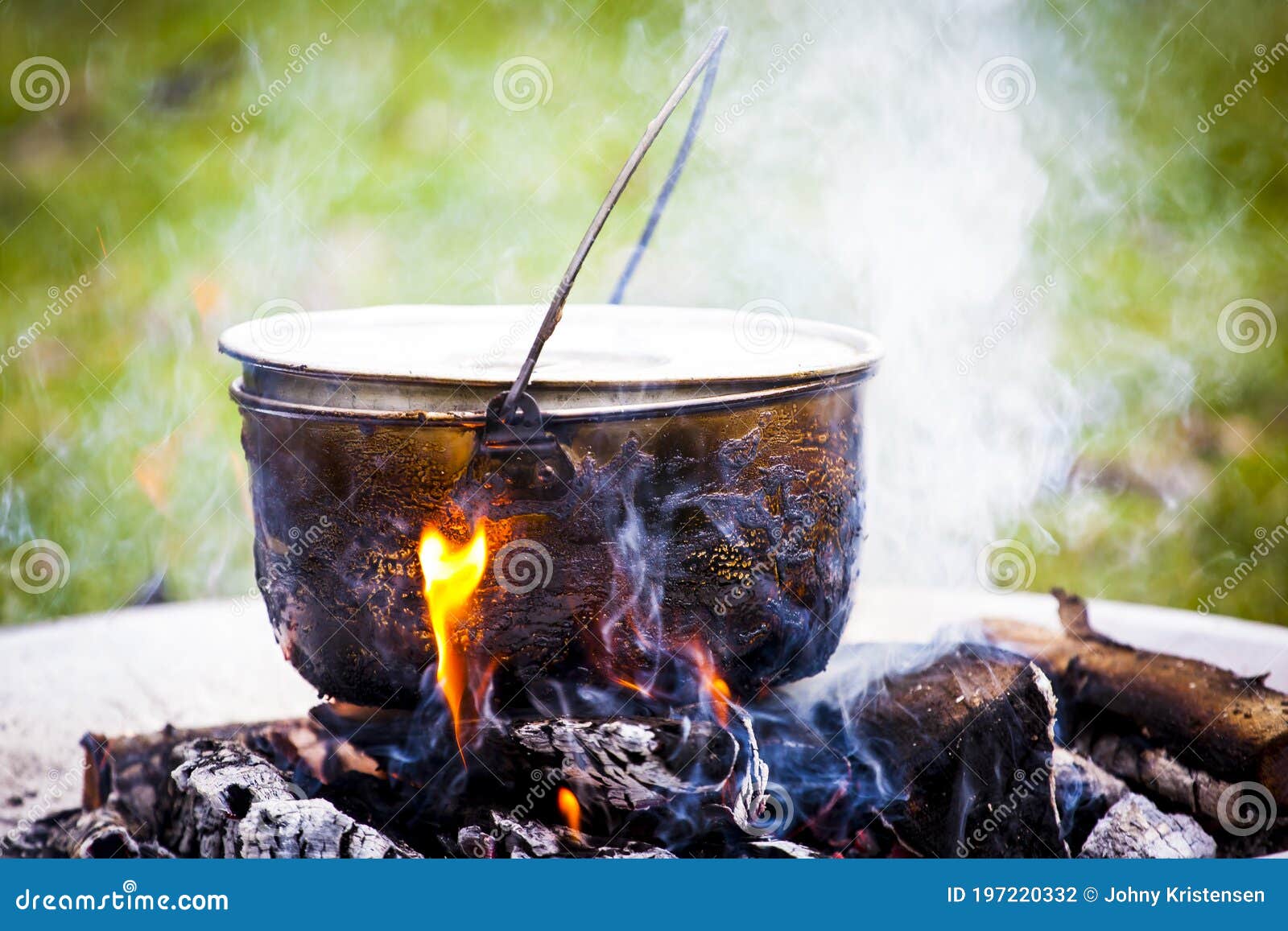 Cooking Large Pot Over The Fire Outdoors Stock Photo, Picture and Royalty  Free Image. Image 79928181.