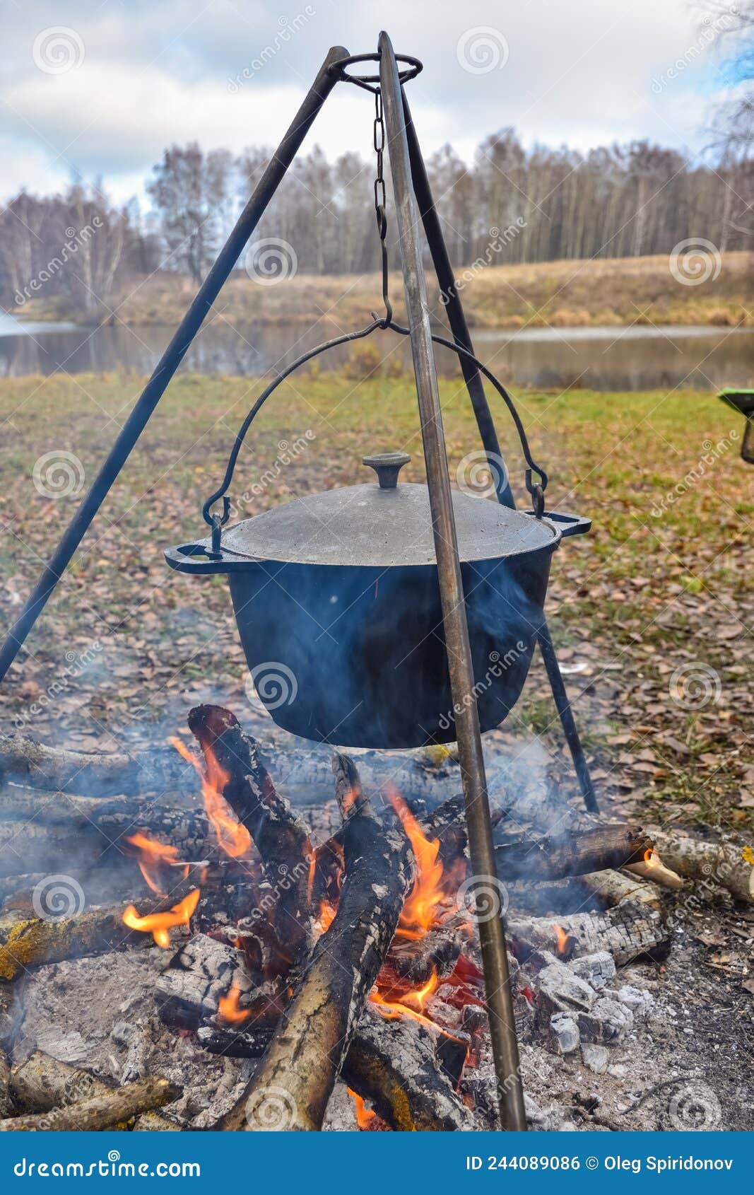 Cooking in Pot on Campfire, Camp Cooking, Hot Food Stock Photo Image