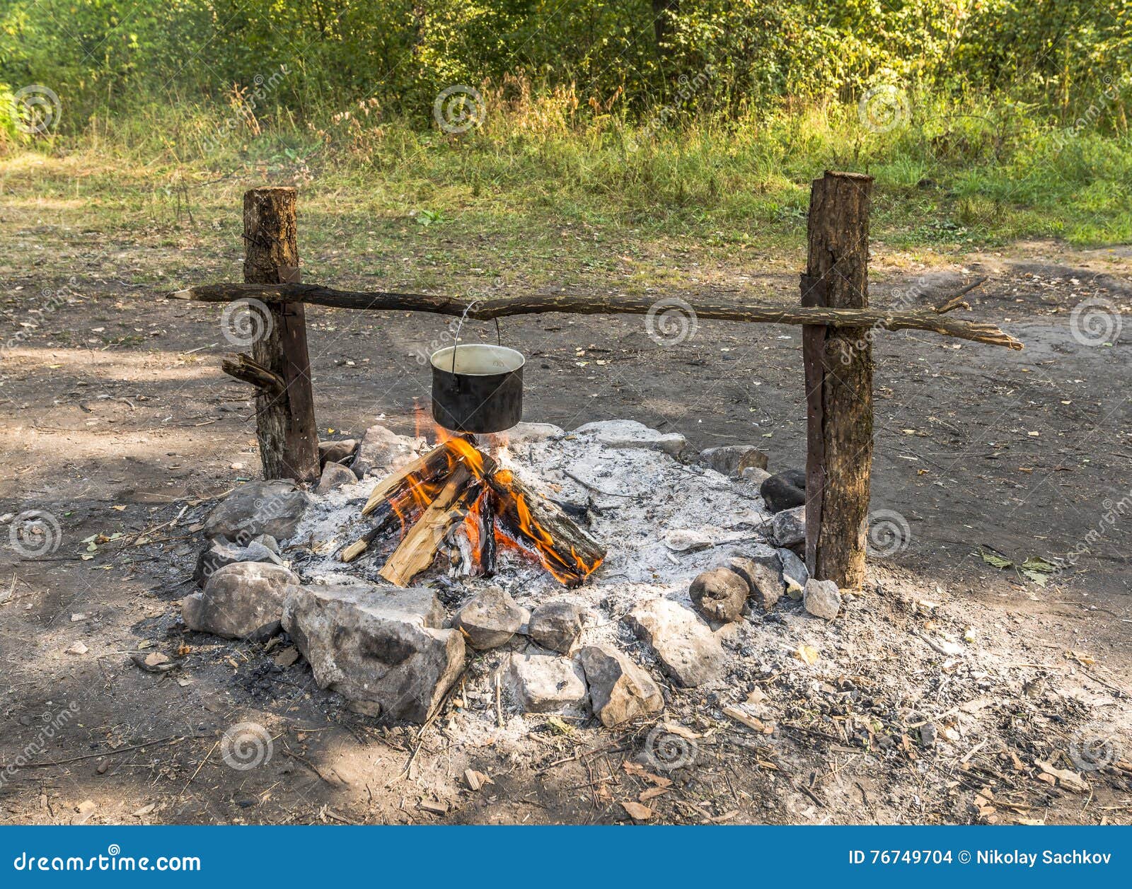 Cooking in a Pot Over the Fire. Stock Photo Image of rural, leisure