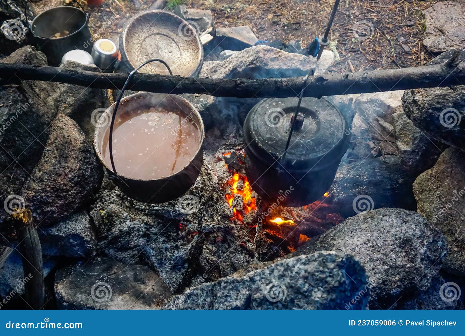 Cooking in a Pot Over a Fire in the Taiga Stock Photo Image of hiking
