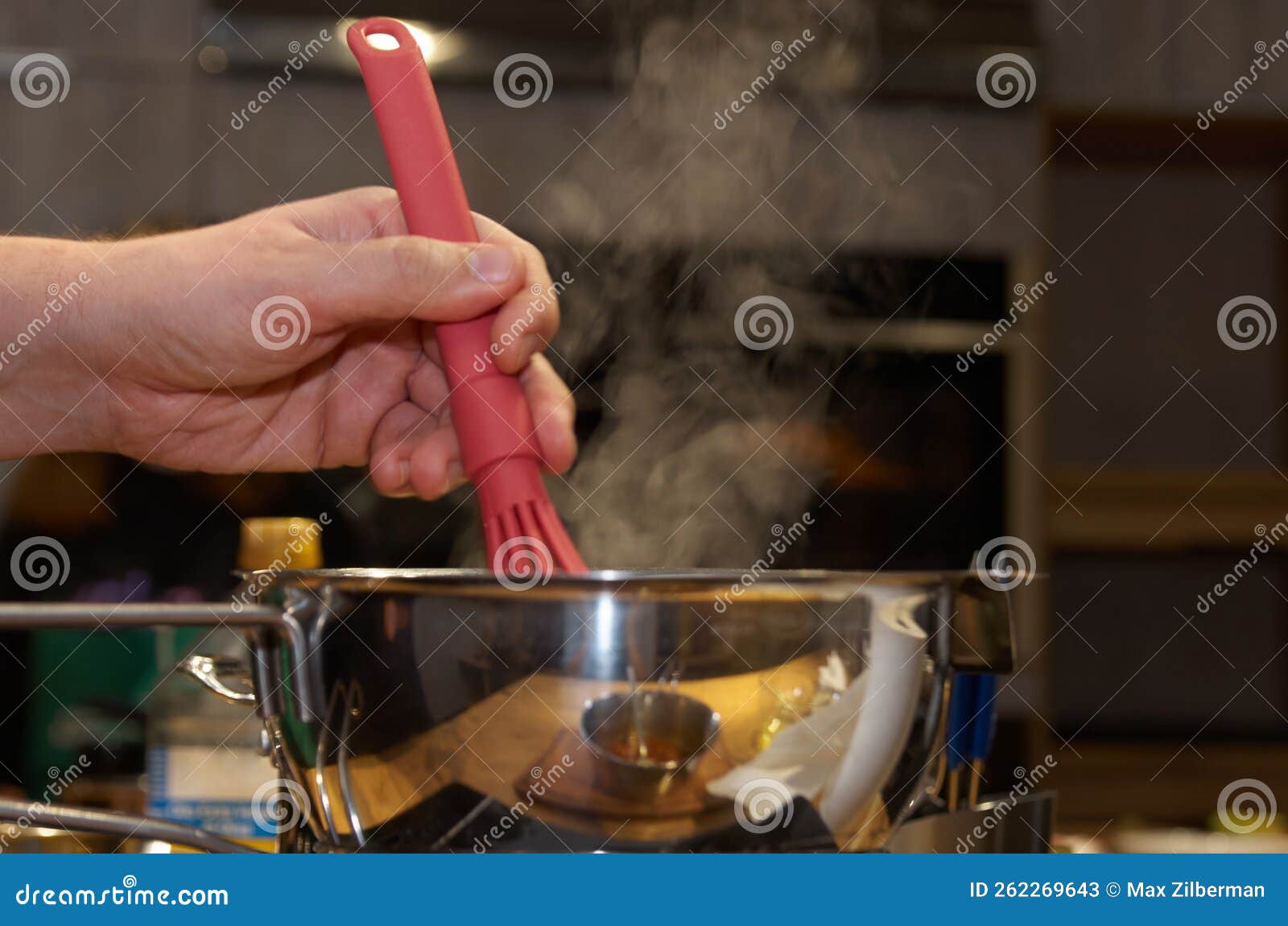 Cooking Process Whisking Sauce in a Saucepan with Rising Steam Stock