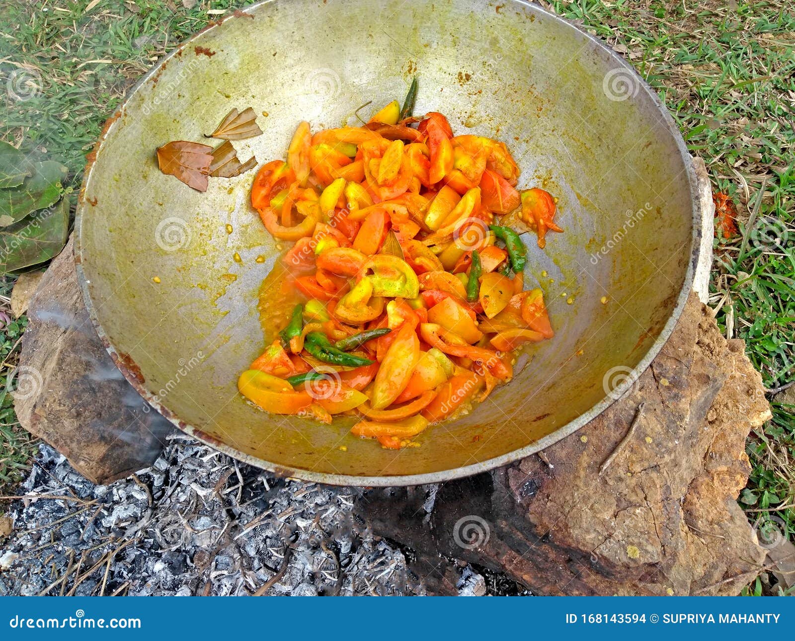 https://thumbs.dreamstime.com/z/cooking-tasty-delicious-indian-sour-hot-tomato-juice-open-field-using-steel-kadai-stone-made-firewood-oven-168143594.jpg