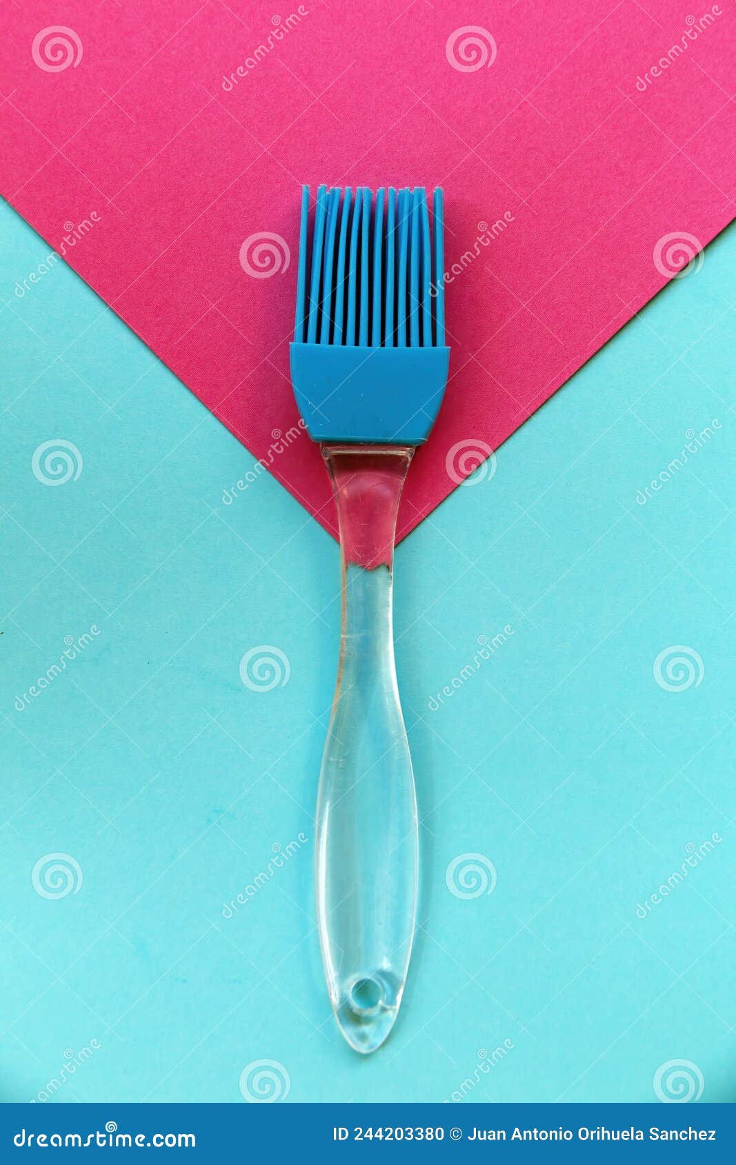 silicone brush on blue and pink geometric background