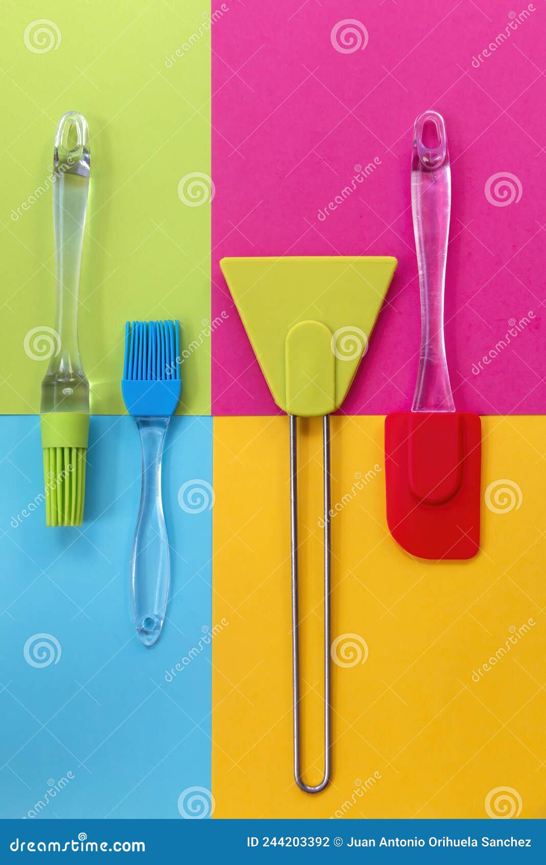 spatulas and silicone brushes on bright colored geometric background