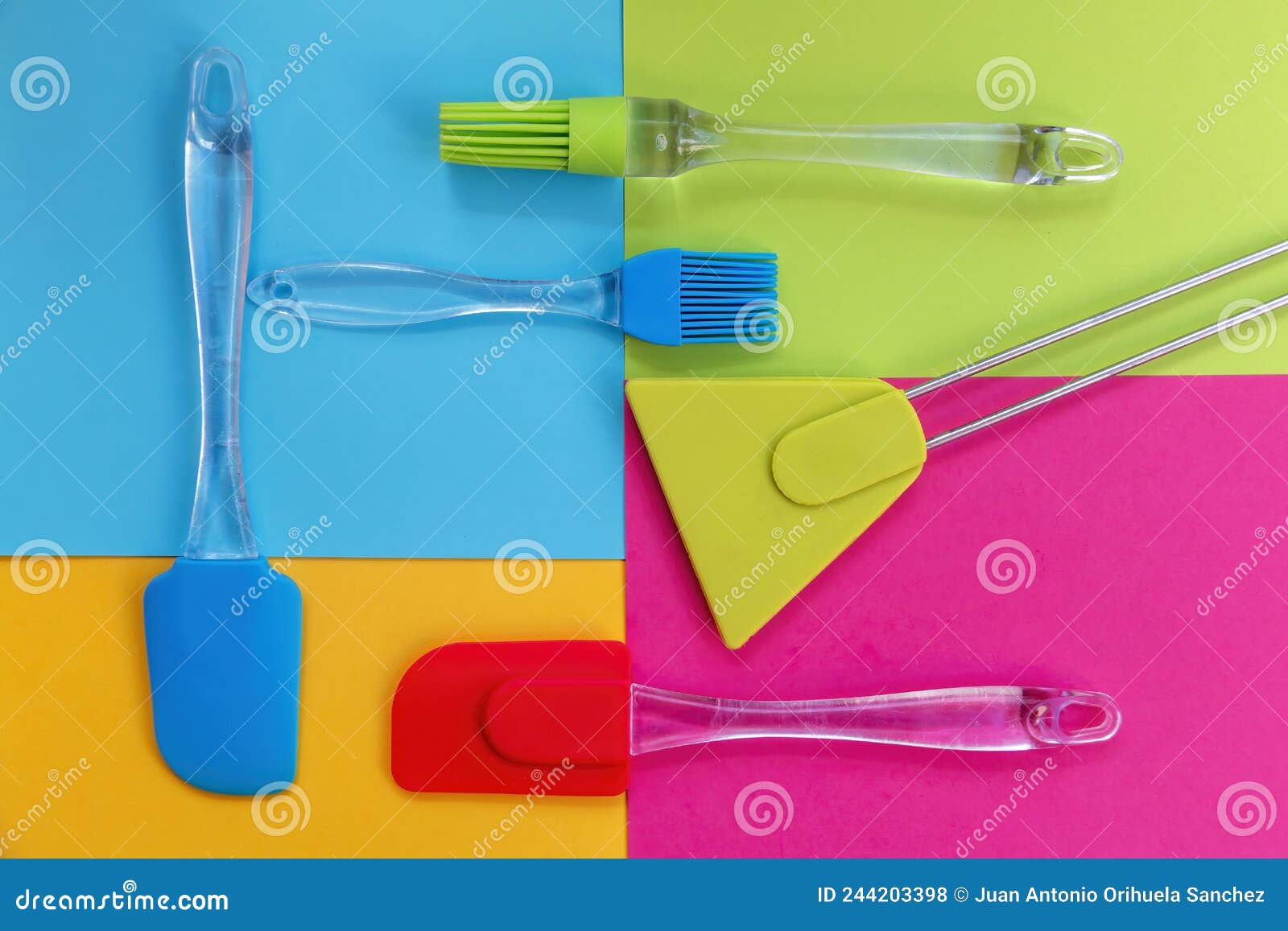 spatulas and silicone brushes on bright colored geometric background