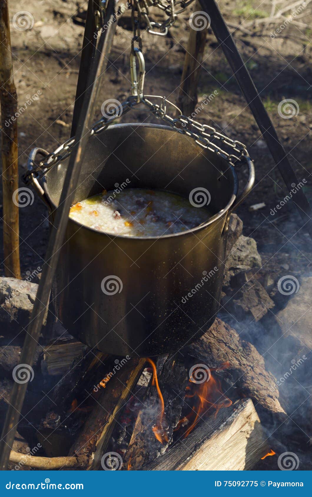 Cooking at the Wood Over Campfire. Casserole with Rice and Meat Stock Image Image of ignite